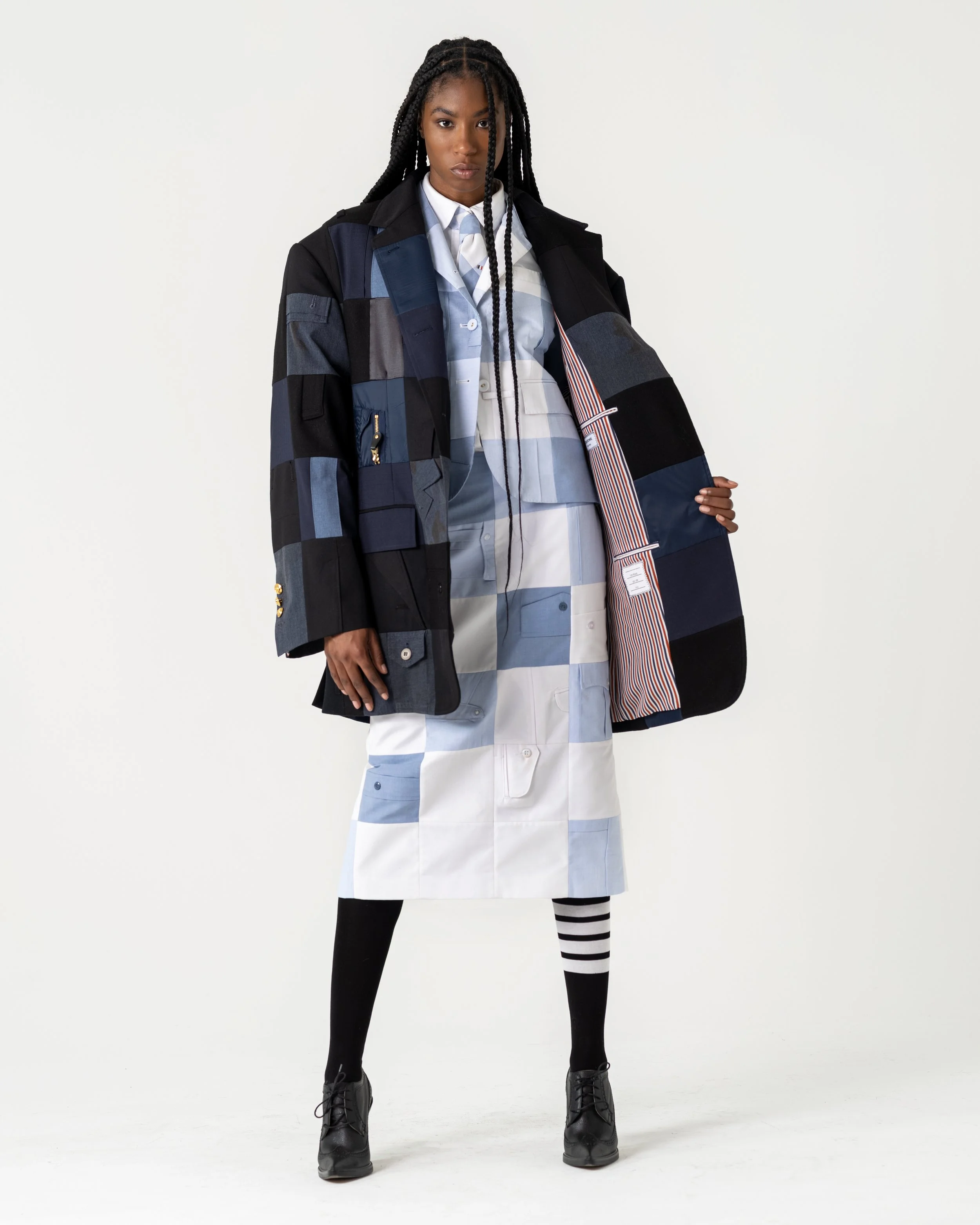 model with long black hair wearing thom brown