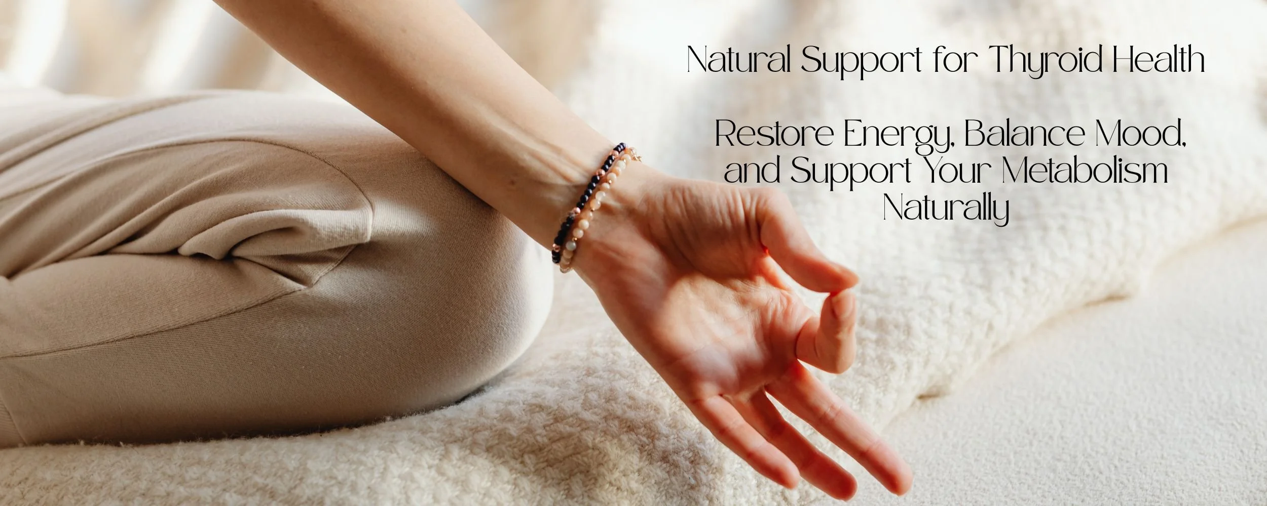 A person sitting cross-legged on a textured beige surface, practicing meditation, with text overlay promoting natural support for thyroid health, energy, mood, and metabolism.