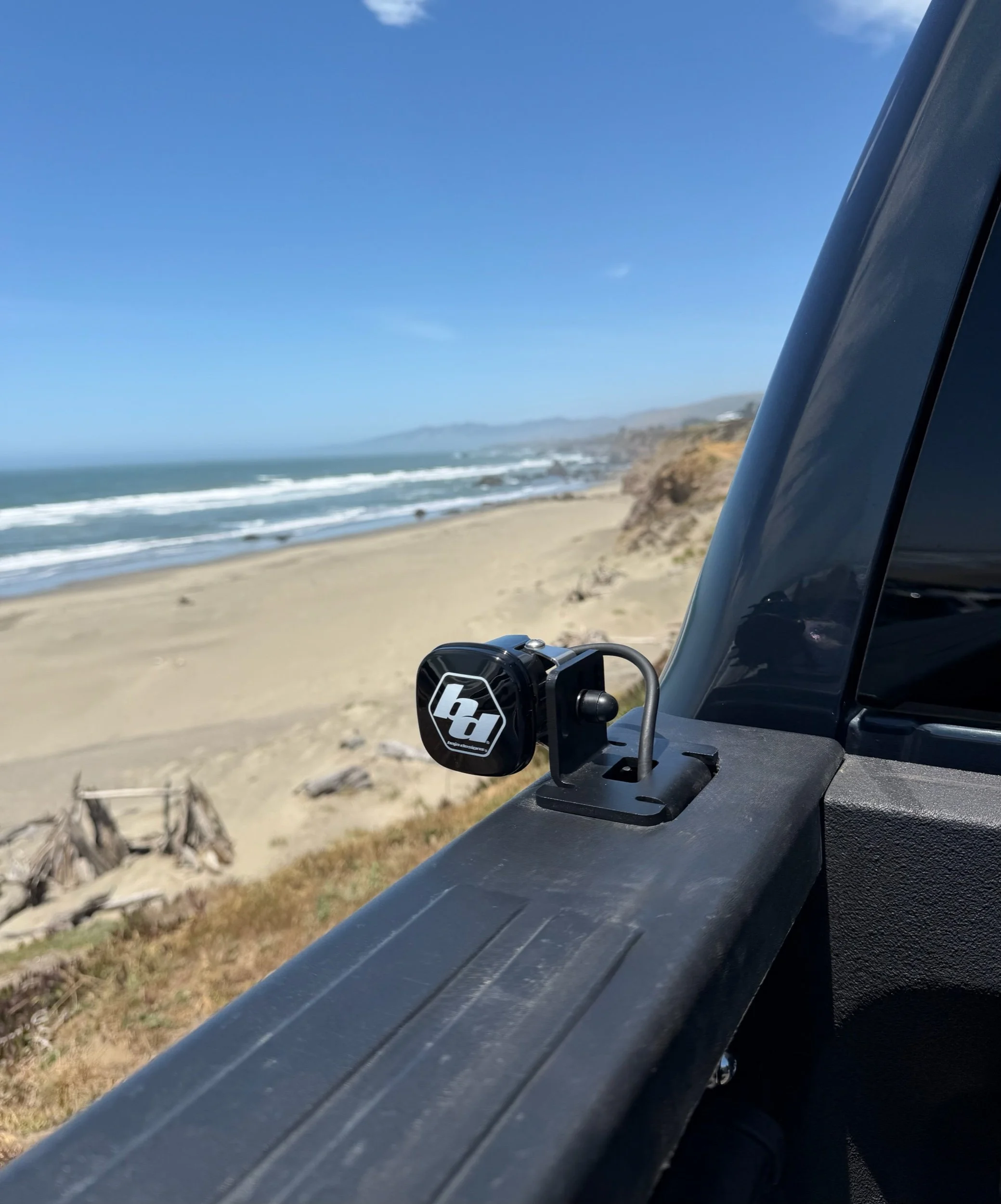 Ram stake pocket chase light bracket with Baja Designs S1 LED light installed.