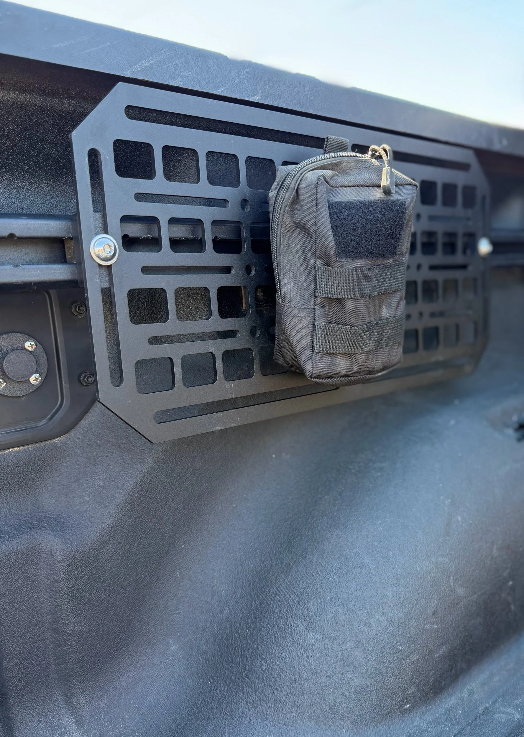 Molle Panel Bed Rail System for 2019+ Ram 1500 trucks mounted to factory bed utility rails without drilling.