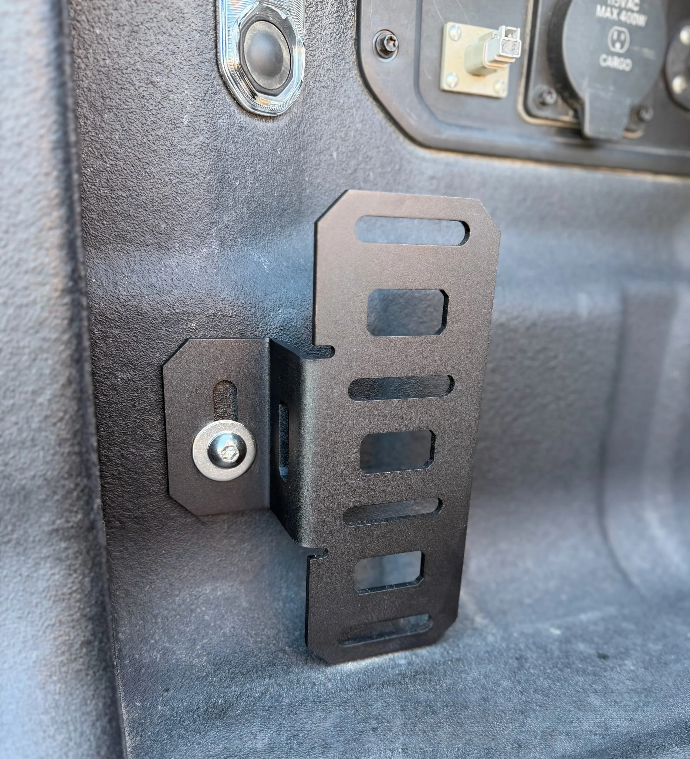 Optional vertical brace kit installed on the Baja Ram Runs Molle Panel Bed Rail System, providing additional support for heavy accessories on a 2019+ Ram 1500 OEM bed utility rail.