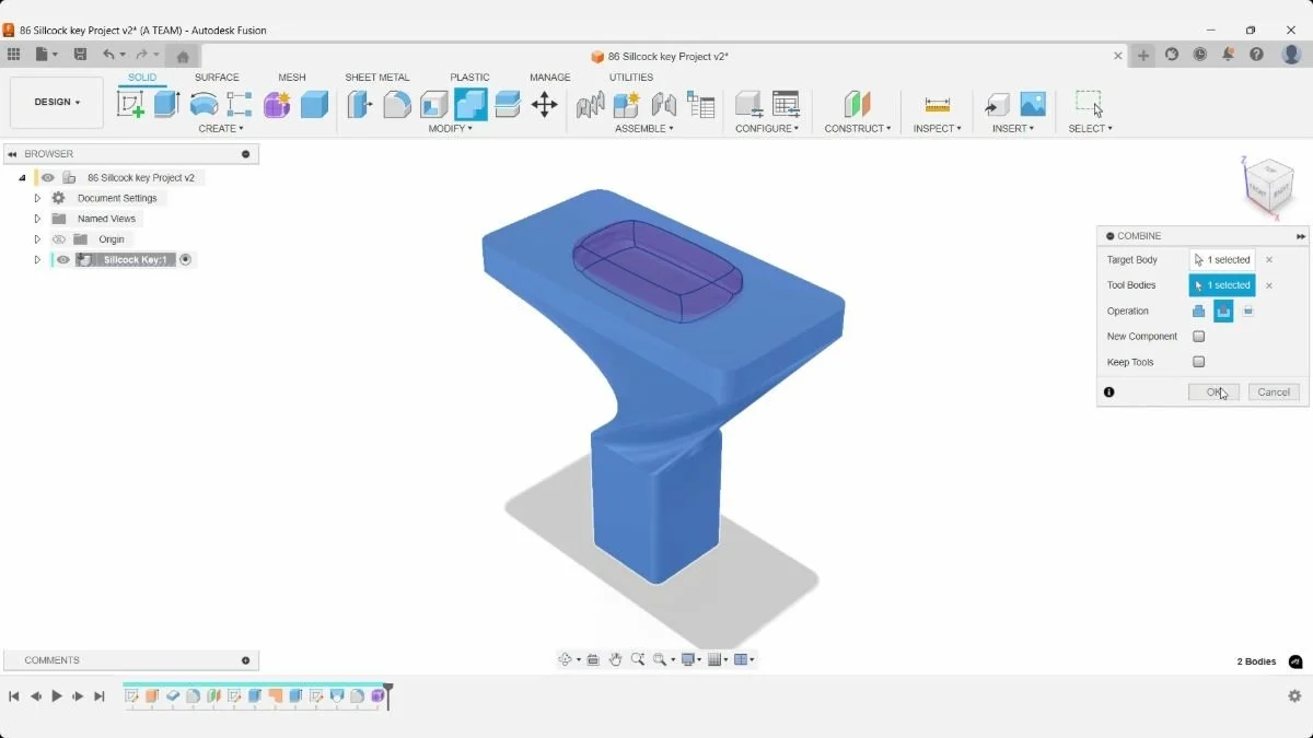 Fusion Combine Cut dialog with the sillcock key as the target and the rounded thumb-recess body as the tool.