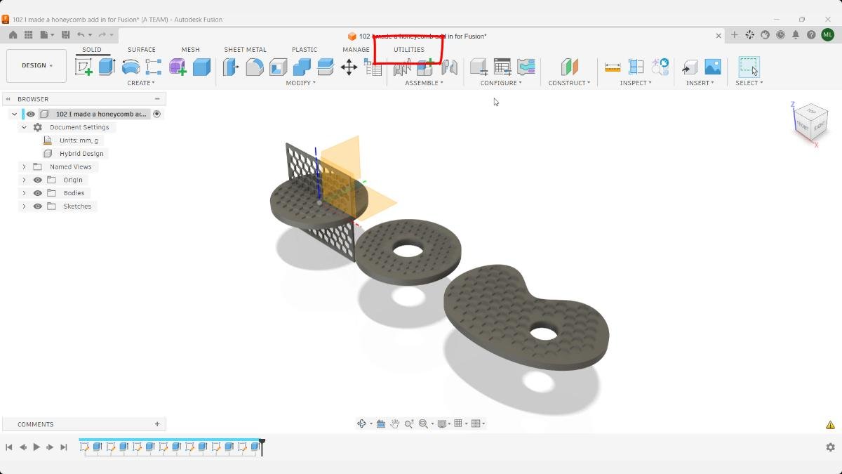 Fusion toolbar with the Utilities tab outlined above the completed honeycomb models.