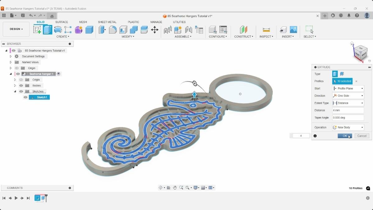 Fusion Extrude dialog selecting internal details of the seahorse design.