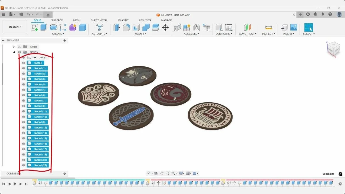 Multiple sword artwork bodies selected in Fusion for a multicolor Viking coaster.