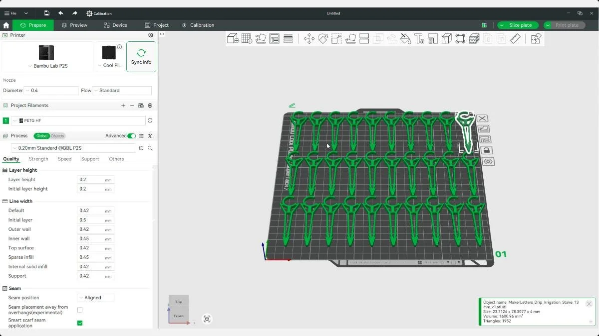 Screenshot of Bambu Studio showing multiple drip irrigation stakes arranged on the 3D printer build plate.