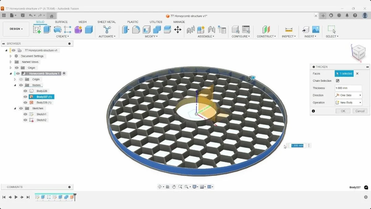 Thickening the outer surface to create a solid border in Autodesk Fusion.