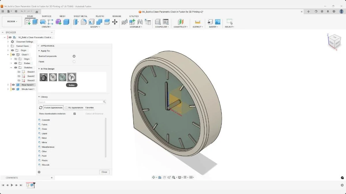 Applying materials and appearances to a parametric clock model in Fusion.