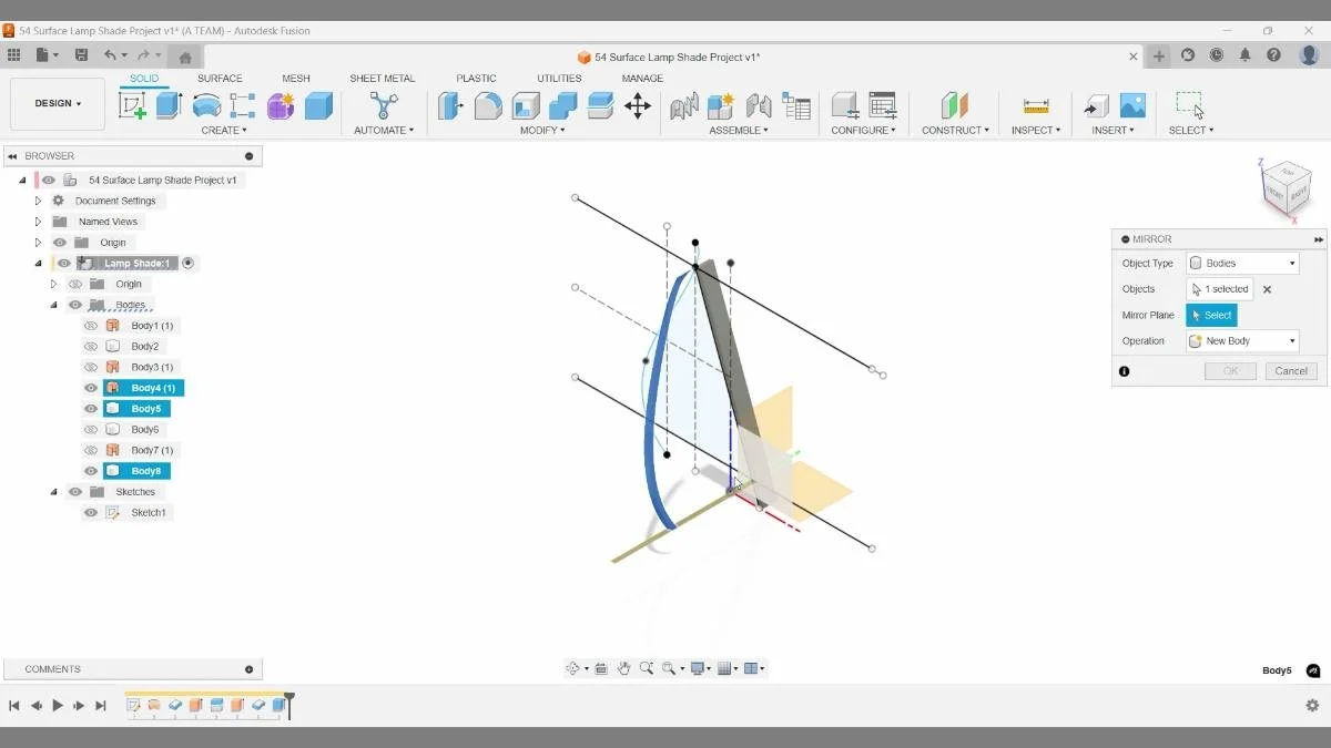 Mirroring the intersected patterned body across the vertical center plane using the Mirror command in Fusion.