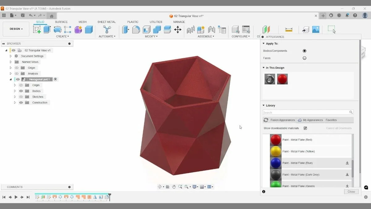 Fusion Appearance tool applying red material to triangular vase