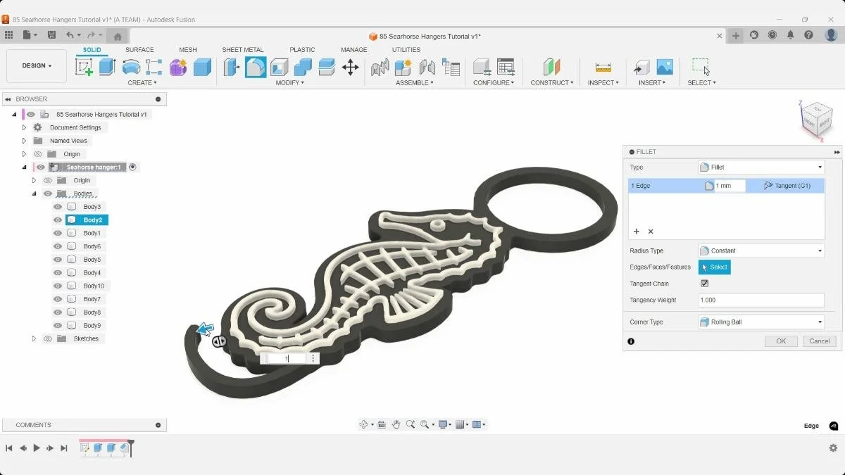 Fusion Fillet dialog beside the completed seahorse hanger model.