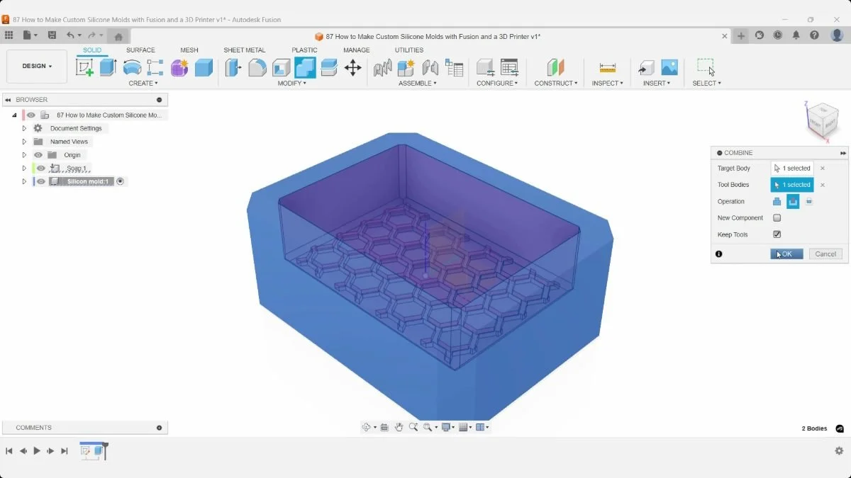 Translucent Combine preview of the soap shape overlapping the silicone mold blank in Fusion.