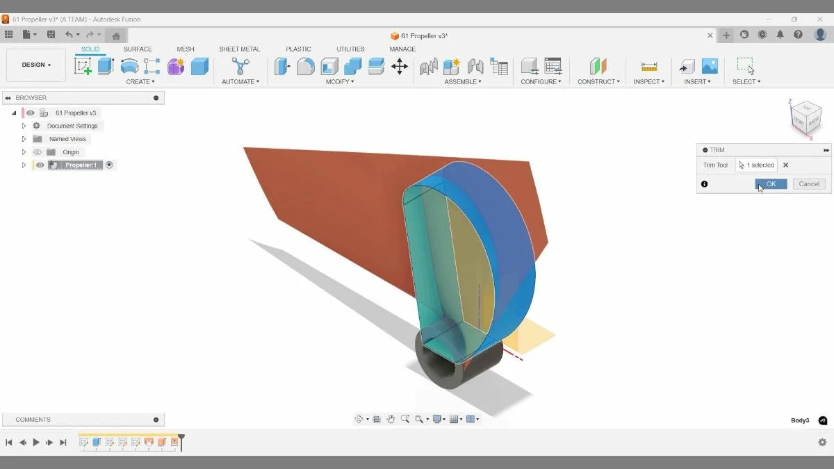 Fusion trim tool removing excess propeller blade surface geometry.