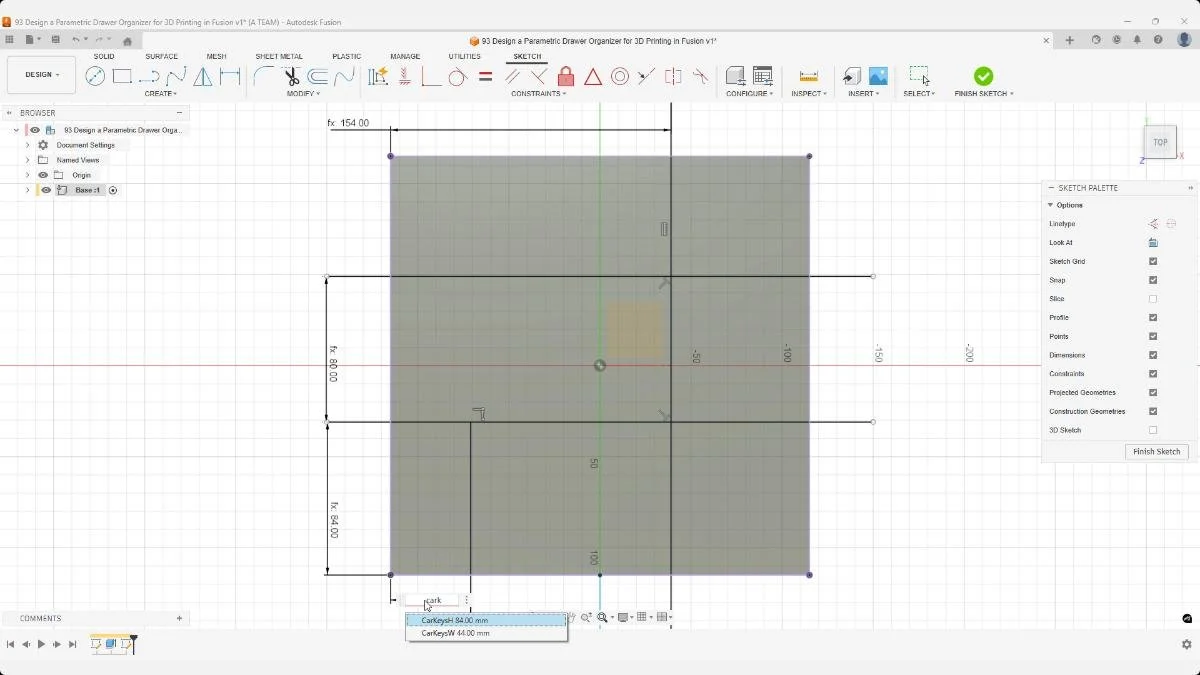 Top-view sketch dimensioning the organizer’s compartment layout.