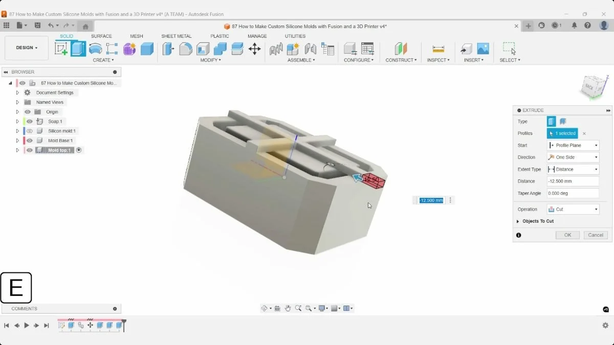 Fusion Extrude Cut preview shortens the end of a mold-top support bar by 12.5 mm.