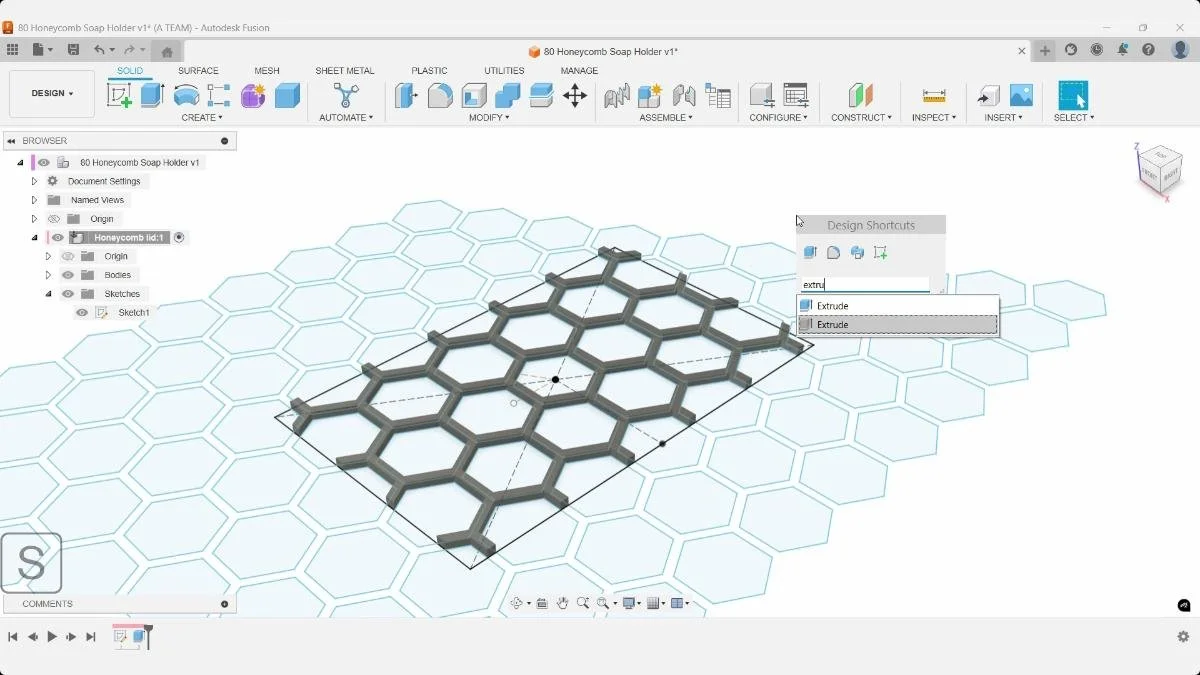 Fusion command search selecting Extrude for the honeycomb soap holder solid geometry.
