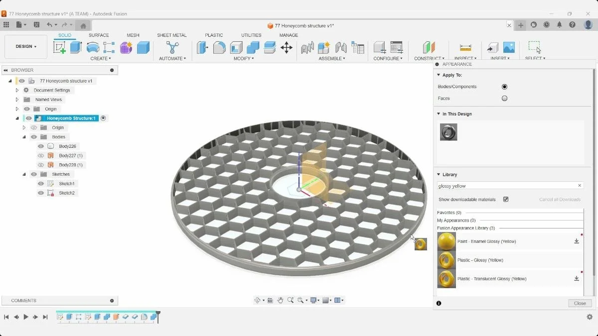 Applying a material appearance to the finished honeycomb model in Autodesk Fusion.
