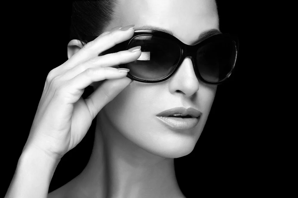 Official STELLA MGMT Talent Portfolio - Commercial Model Headshot featuring accessory styling and dramatic lighting. High-fashion casting shot for Melbourne & Sydney divisions. Represented by Navun Pty Ltd