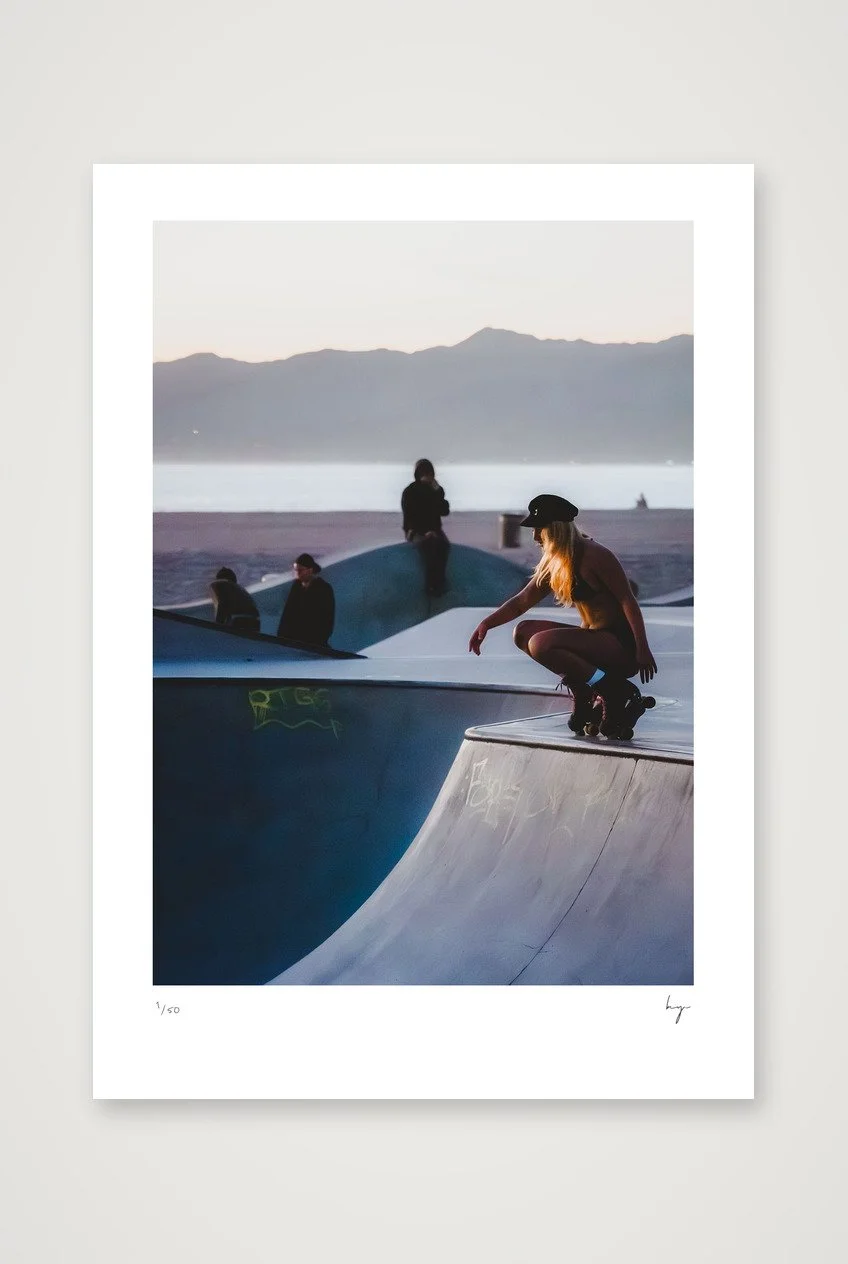 Beautiful girl skating at venice beach