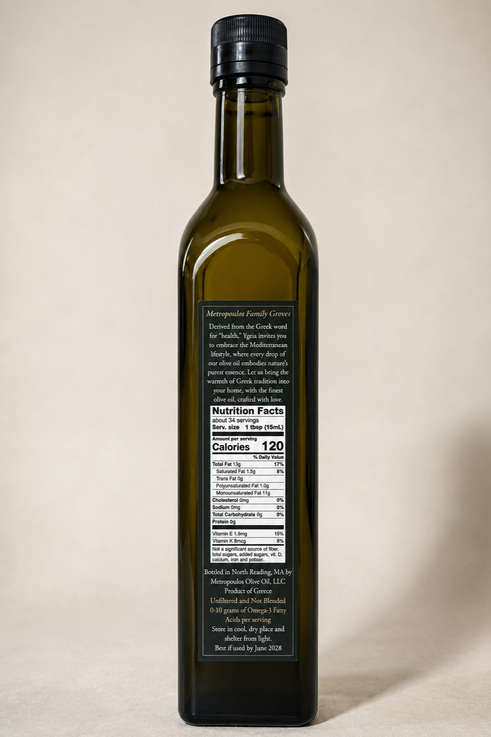 Back of Ygeia Greek Extra Virgin Olive Oil bottle showing Nutrition Facts, ingredients and product information.