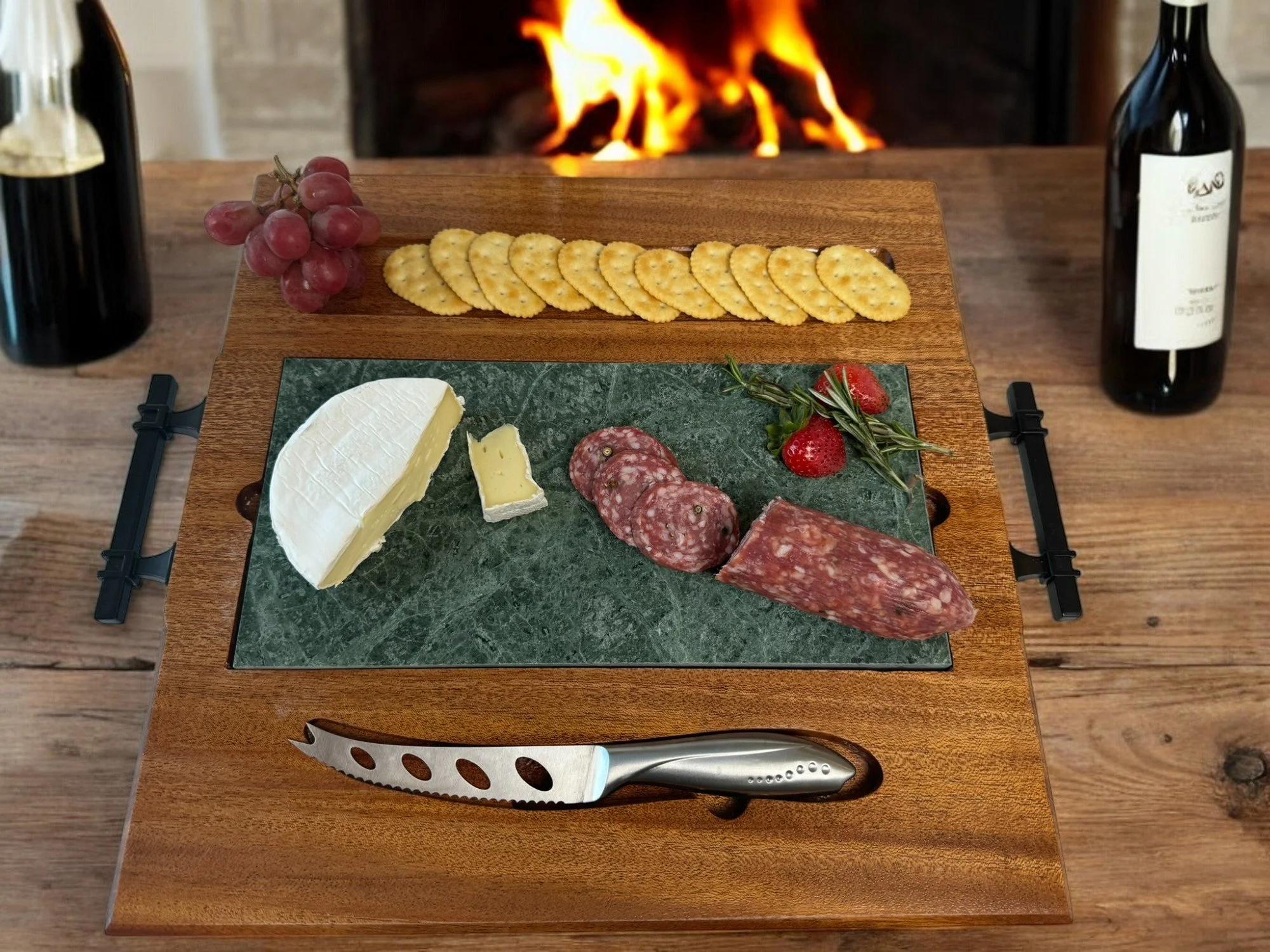 Cherry with a four inlaid knives and black marble inset.