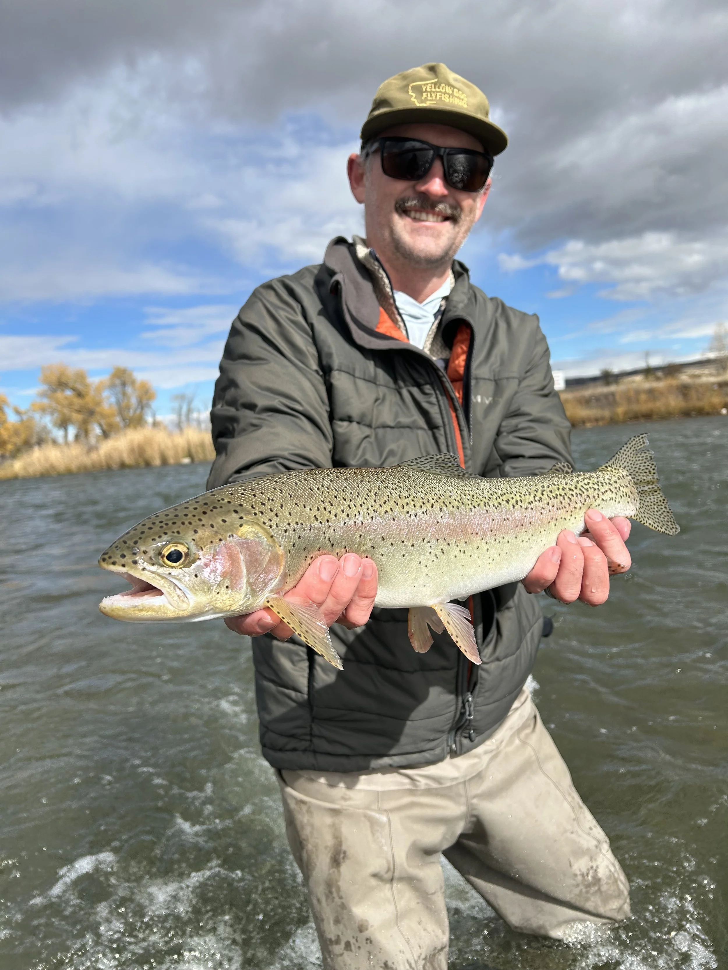 Large trout caught on fly rod during guided trip in southwest Montana