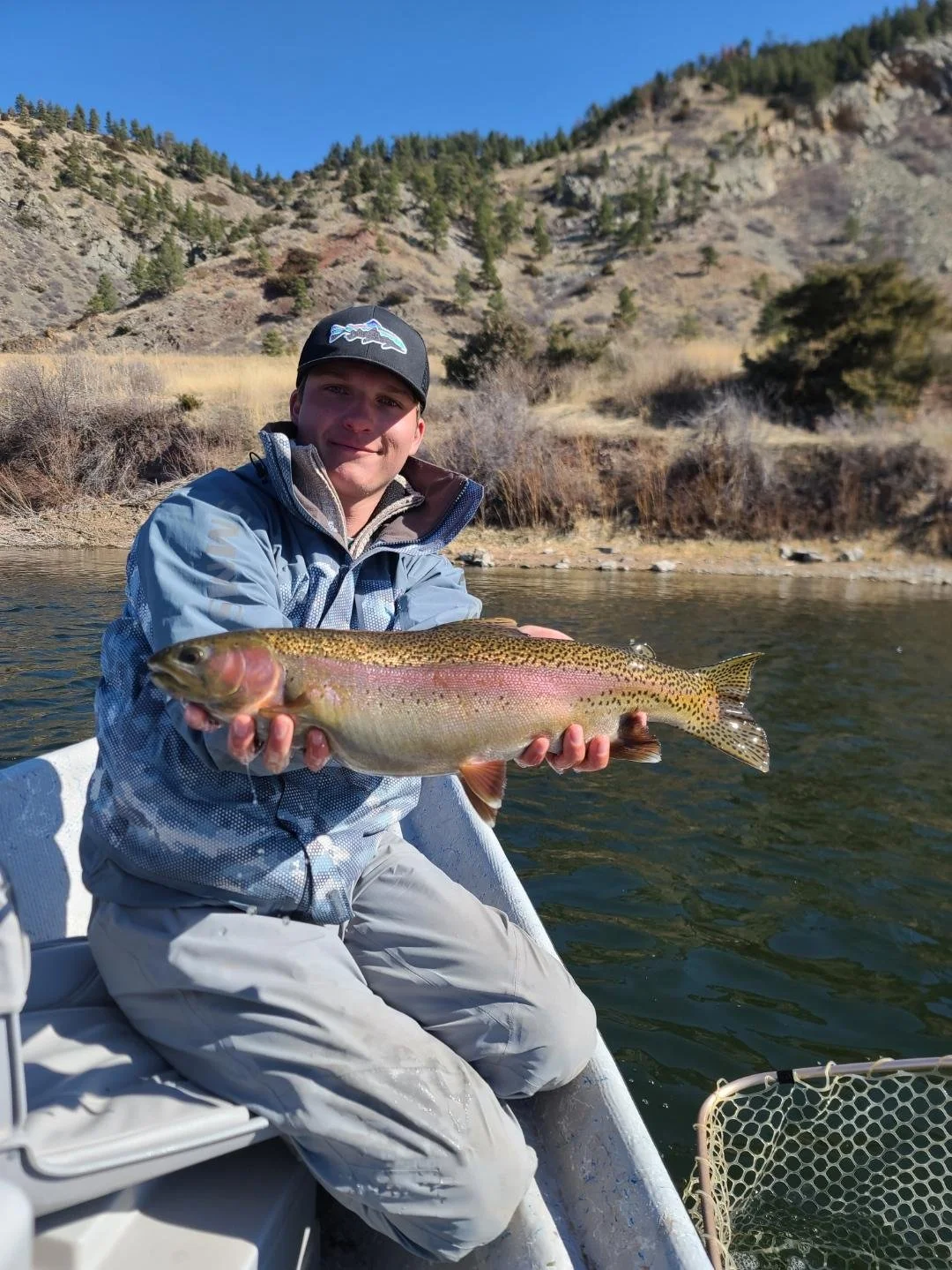 Chunky fat rainbow held by a client on the Missouri River