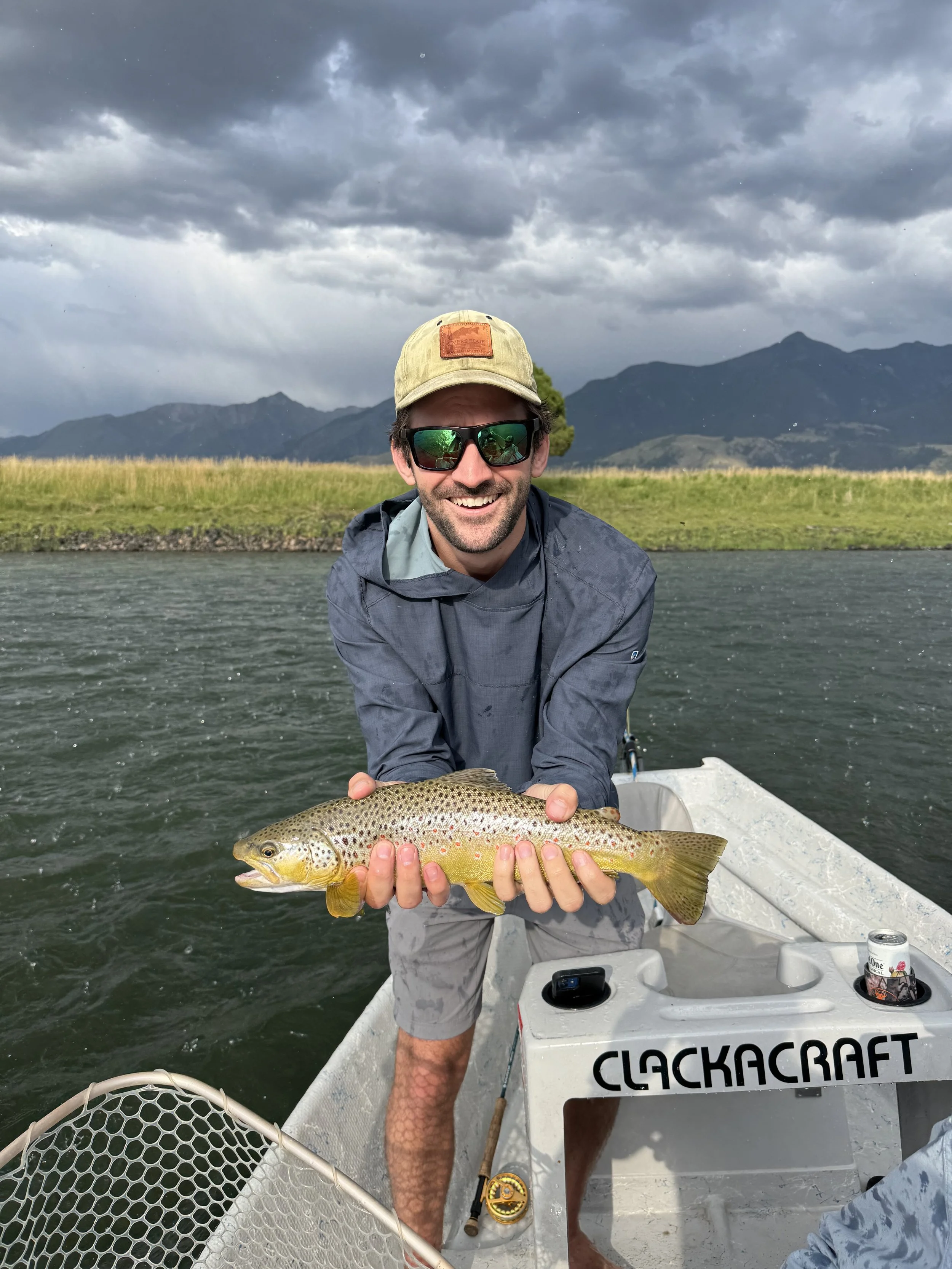 Client learning to fly fish with guide in Bozeman Montana