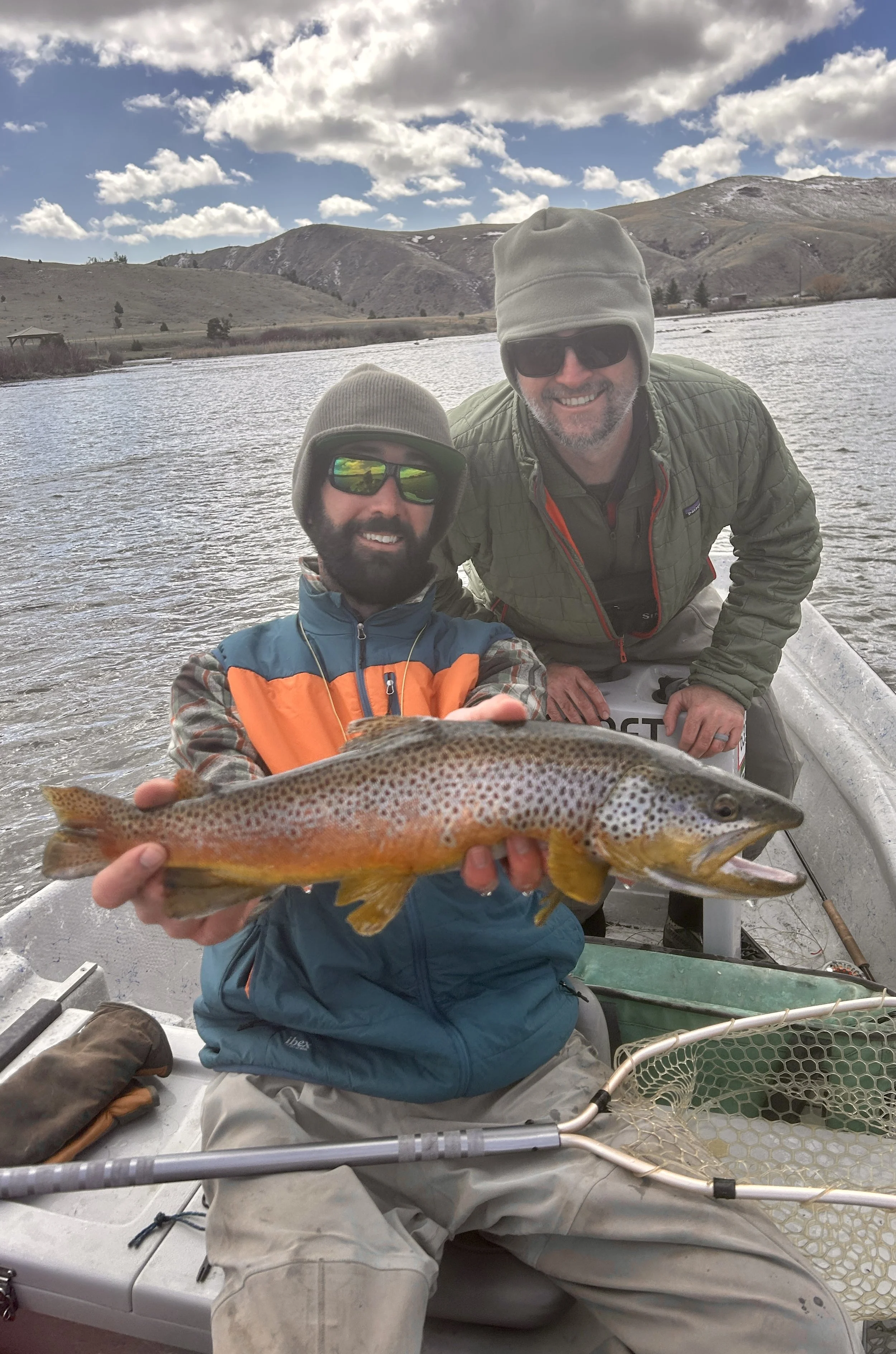 Fly fishing drift boat on the Madison River in Montana