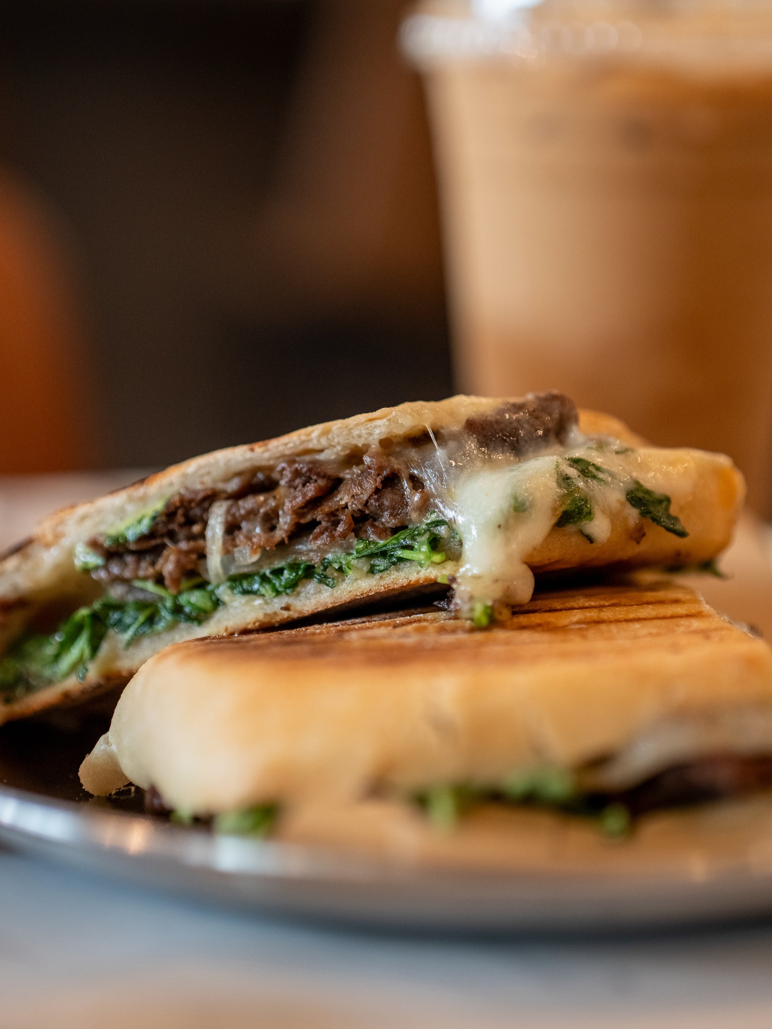 Forever and always throwing down on a Cinna-Honey Latte and Beef Bulgogi Panini at @lth.duluth 🔥 So grateful for how convenient it is to be in the zone knocking out design projects and video edits all afternoon and not have to stop what I&rsquo;m do