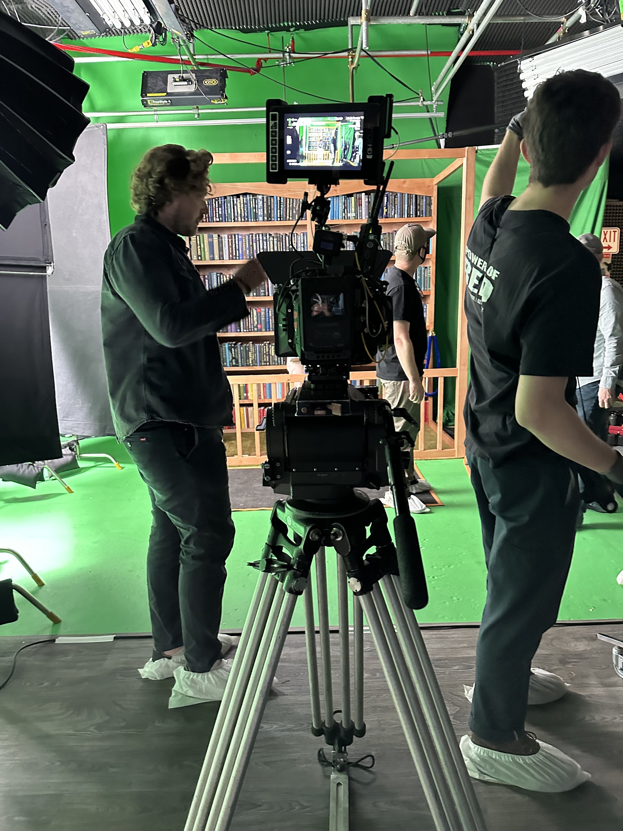 The DP adjusting the equipment within this specific scene.