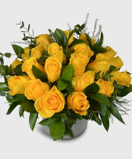 Yellow Roses In Low Vase