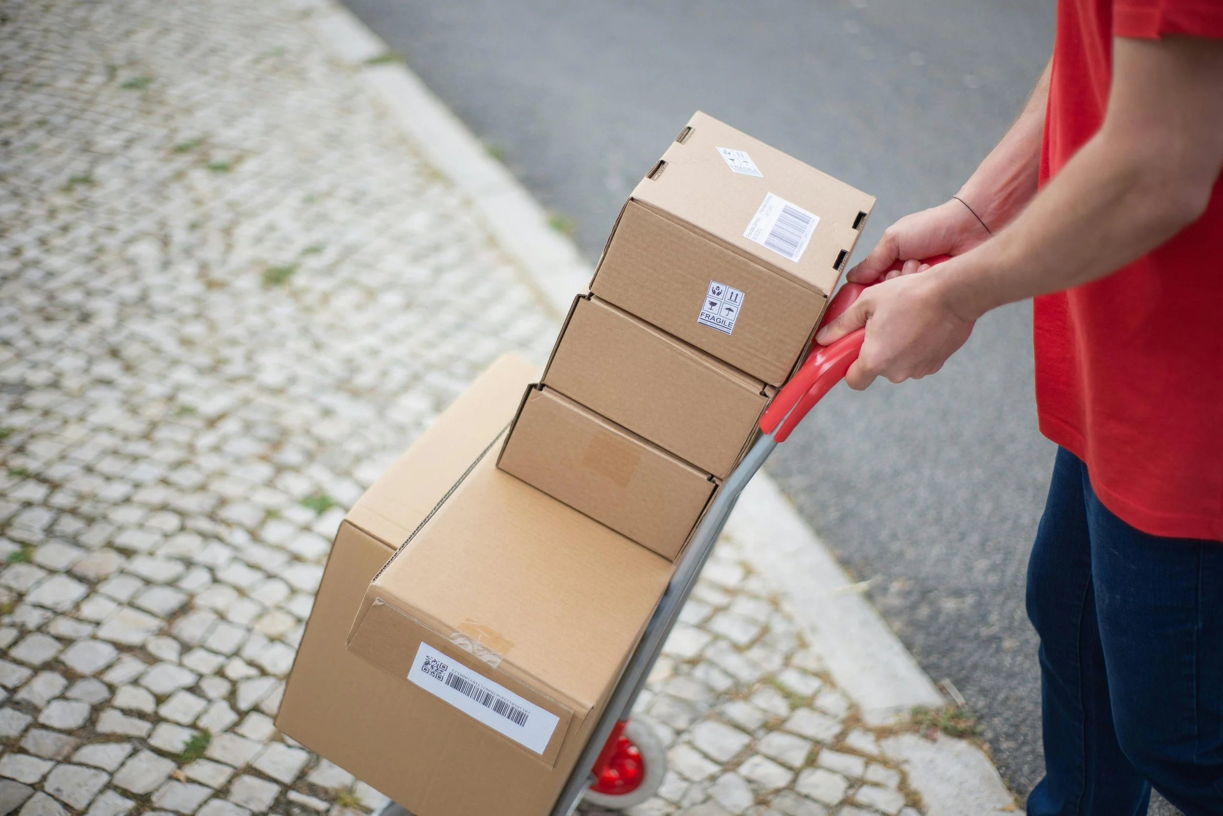 Courier transporting business parcels for a scheduled delivery