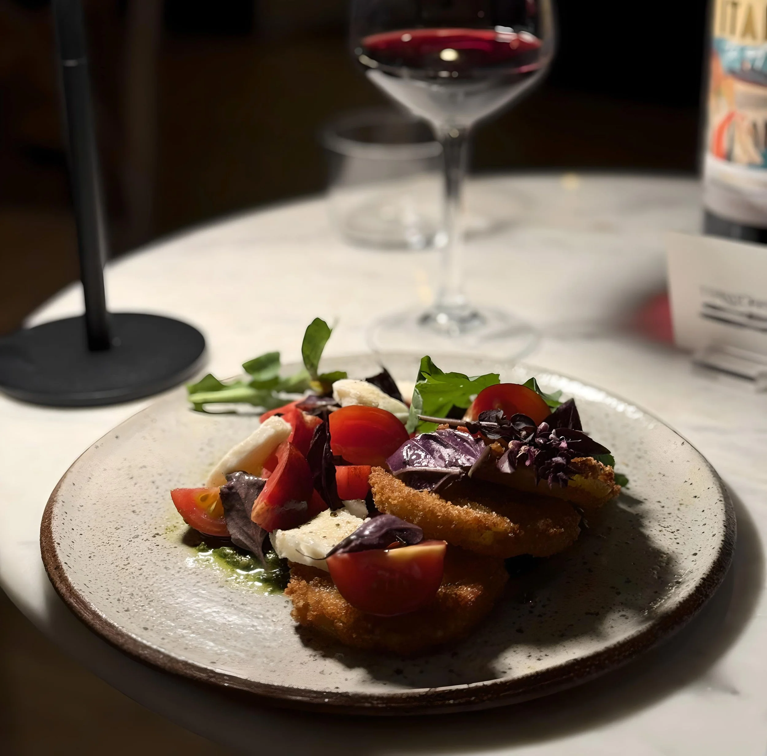 FRIED GREEN TOMATOES
buratta, Munak Farm's green zebra tomatoes & sunflower seed pesto, basil & tomato vinaigrette