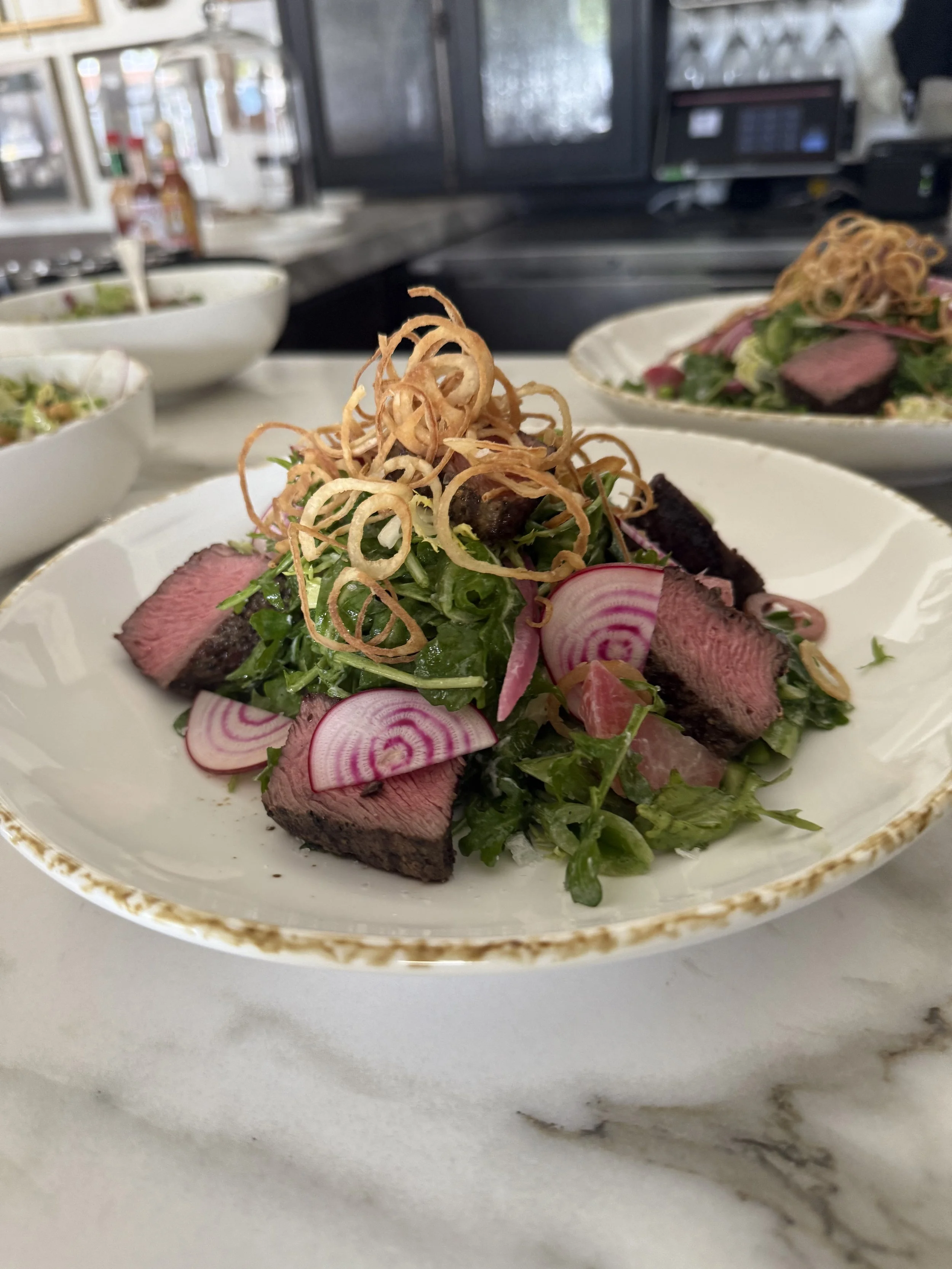 Flat Iron Steak Salad
creekstone ranch flat iron, tamai’s arugula & mustard frill, pickled onions, radishes & roasted beets, goat milk chevre & crispy shallots, sherry vinaigrette