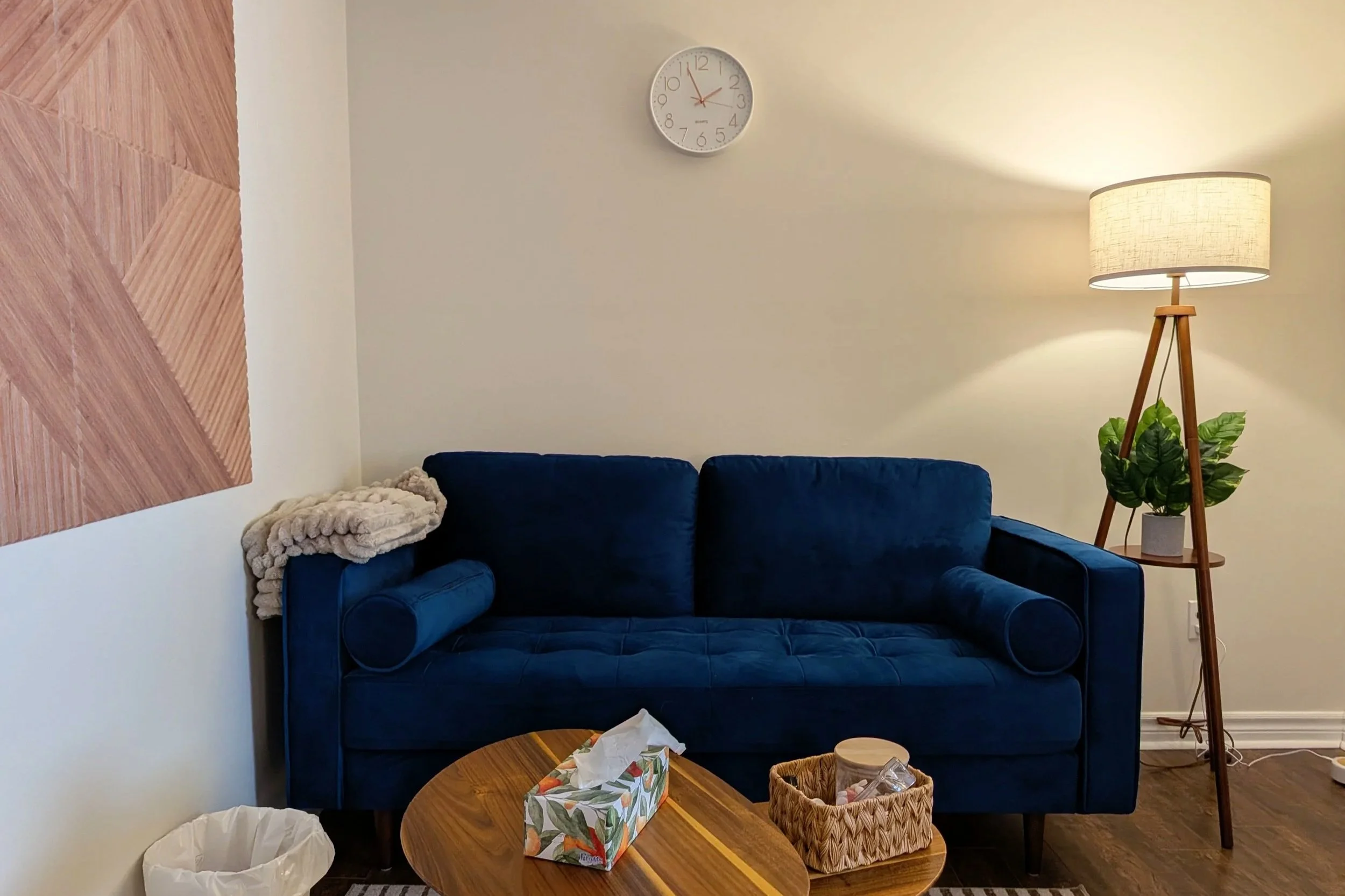 Blue therapeutic room at Root Bloom Thrive, a mental health clinic comprised of therapists and a Registered Dietitian in Sudbury, Ontario.