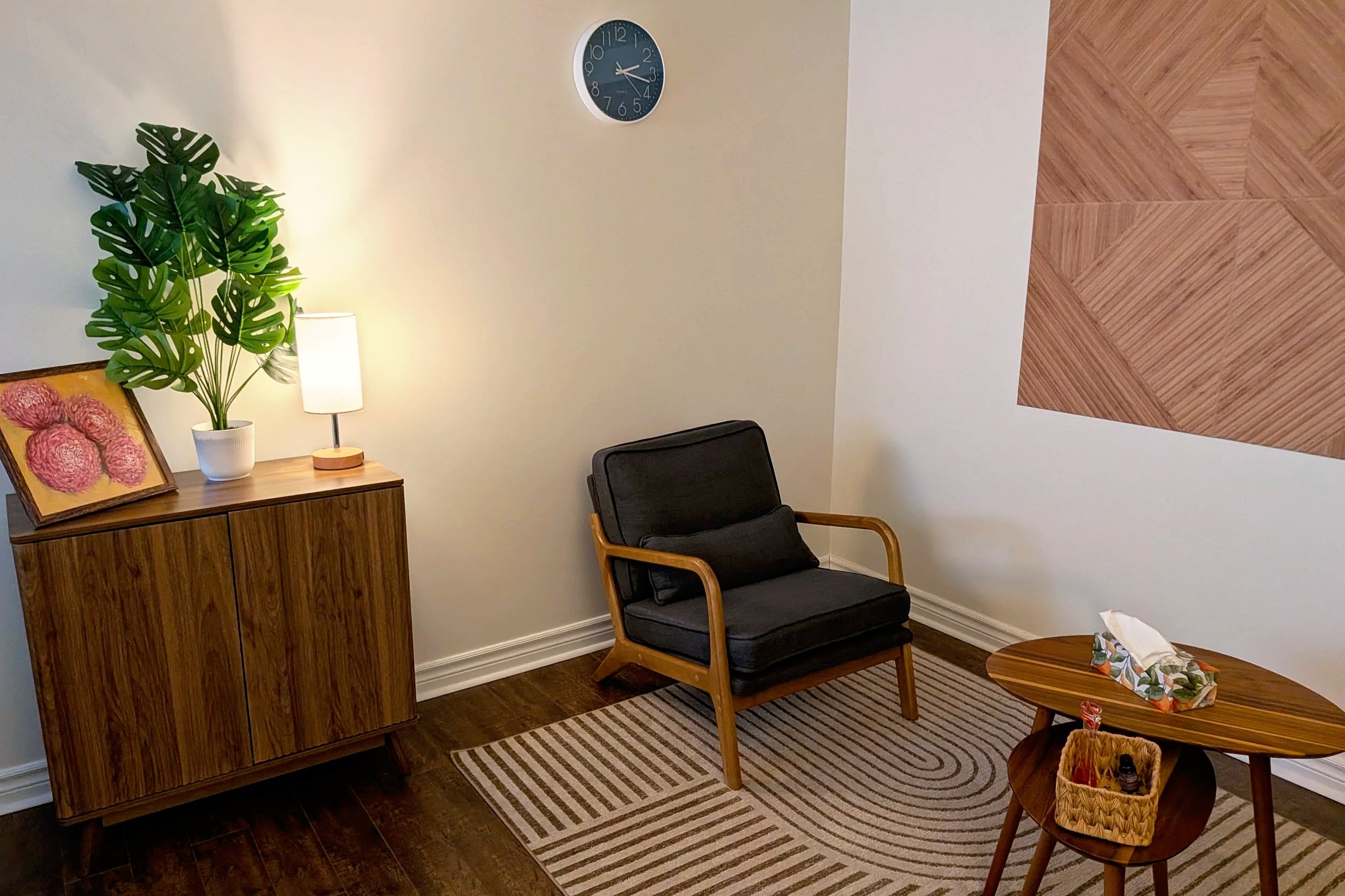 Blue therapeutic room at Root Bloom Thrive, a mental health clinic comprised of therapists and a Registered Dietitian in Sudbury, Ontario.