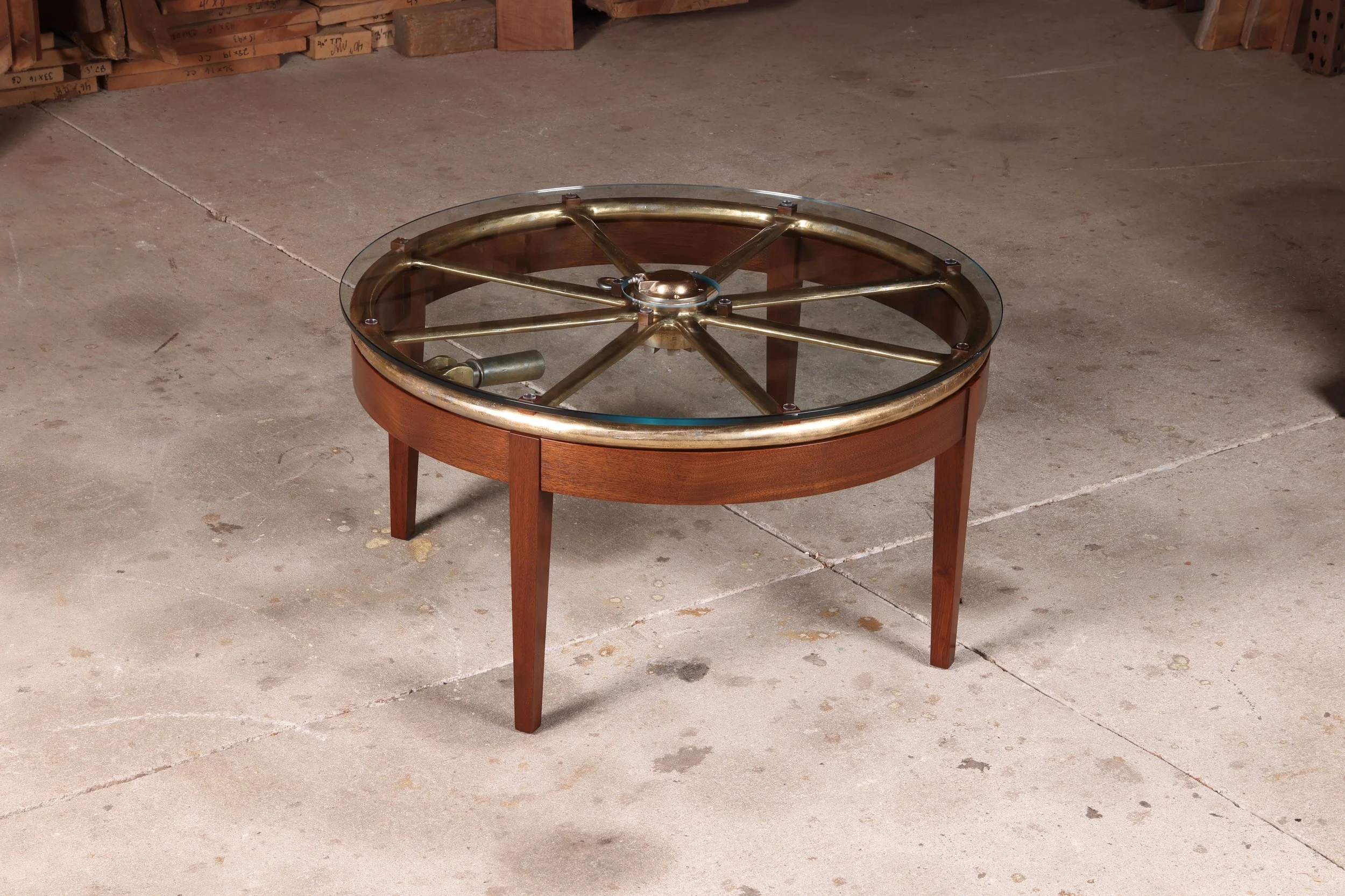 Handcrafted custom walnut coffee table, original diving plane valve wheel from the WWII Gato Class submarine USS Shad, round glass top.
