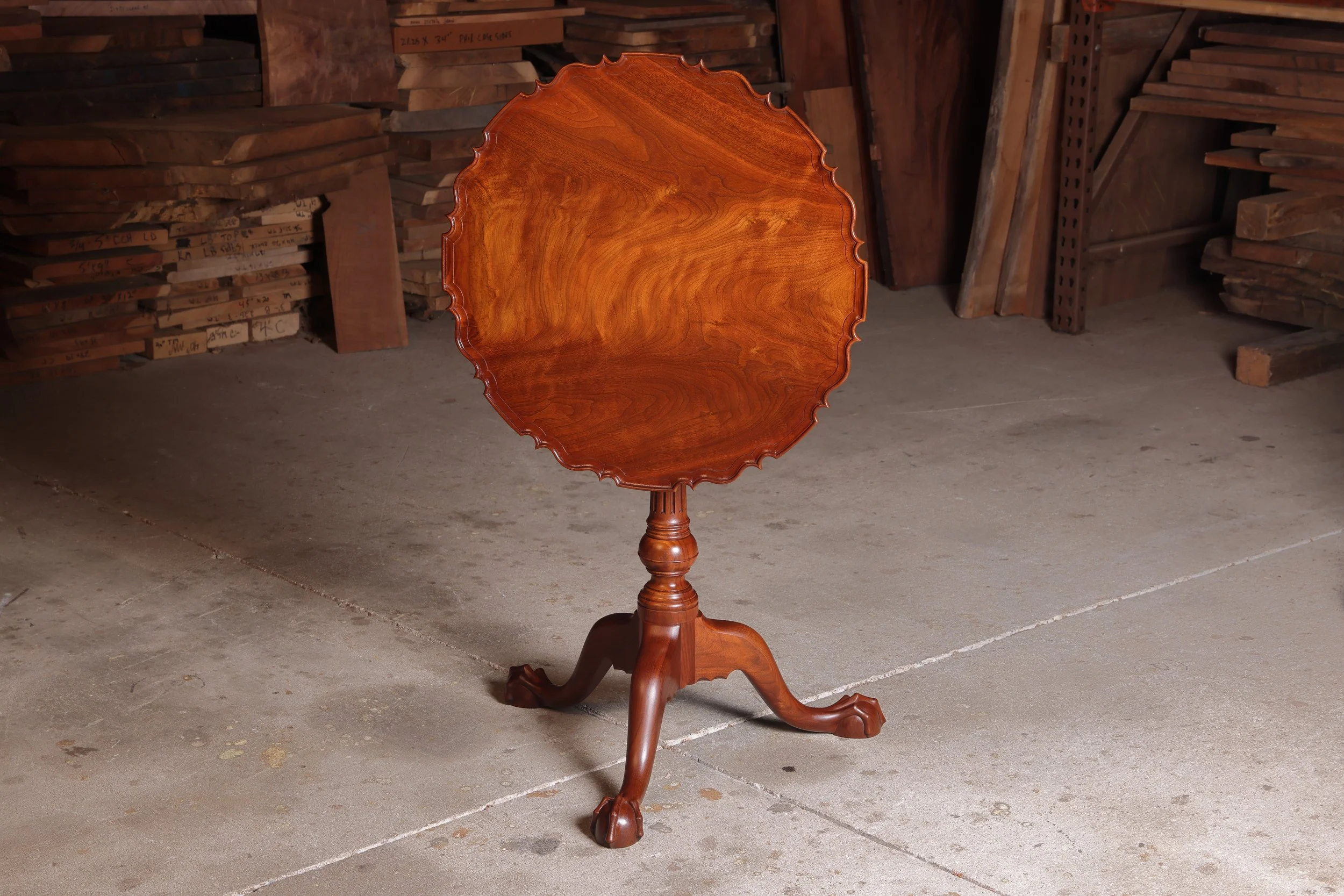 Irion Company walnut piecrust tea table with a hand rubbed shellac finish.