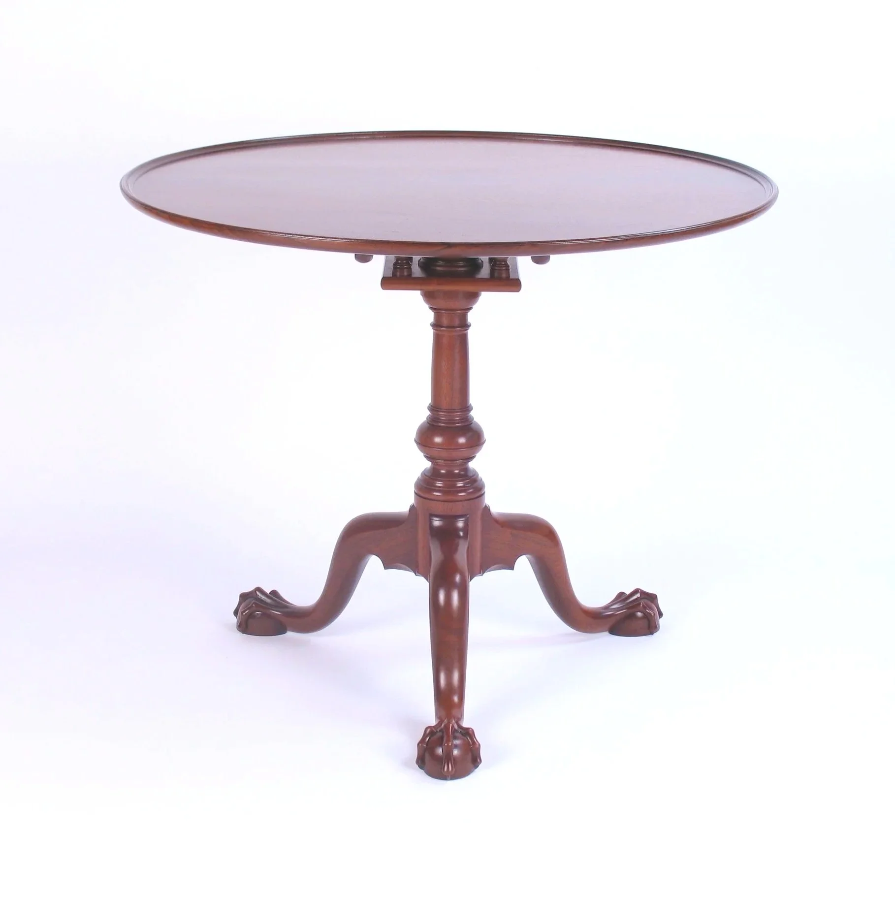 Philadelphia Tilt Top Tea Table with 35" diameter single board crotch walnut top.