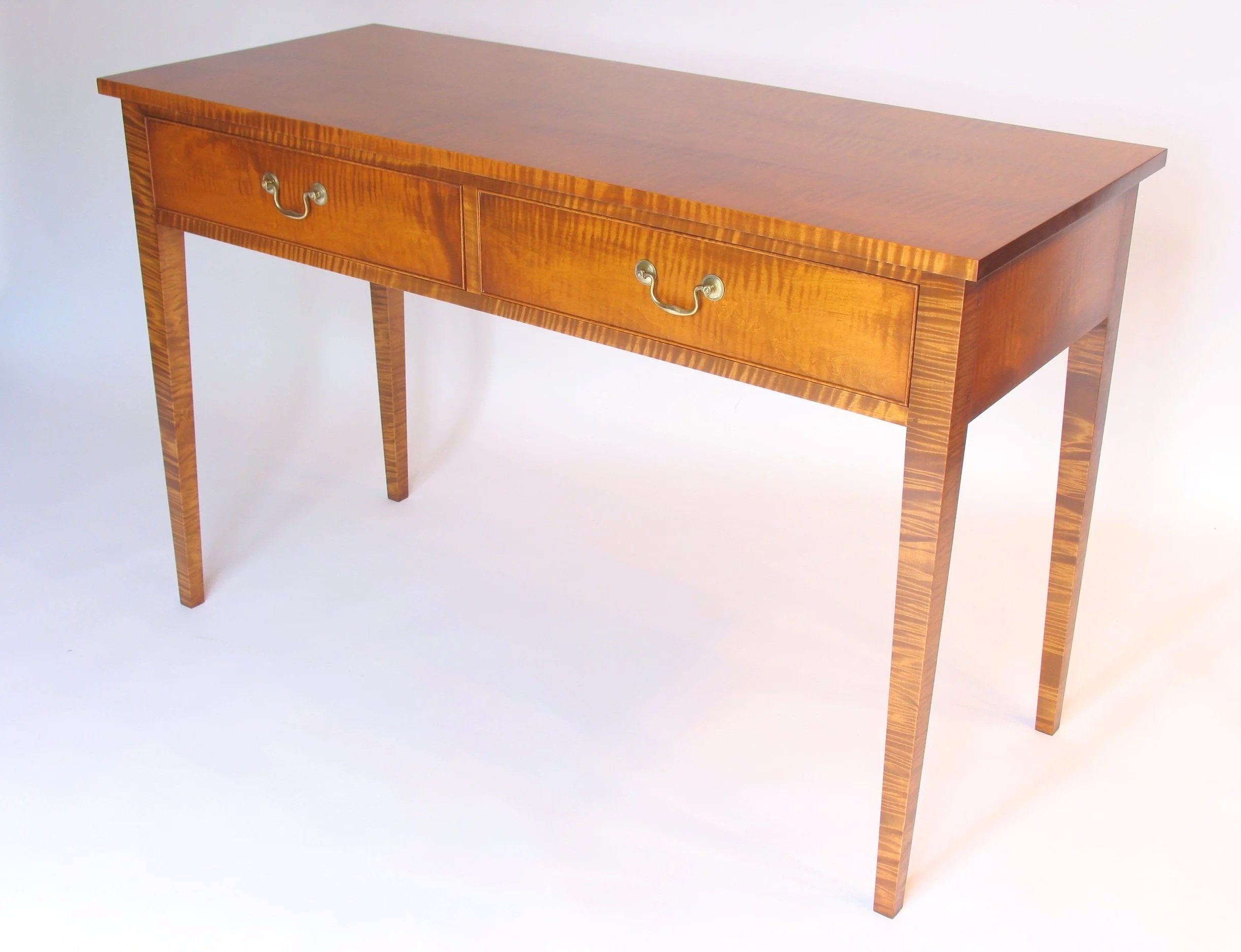 Handmade Writing Table in tiger maple.