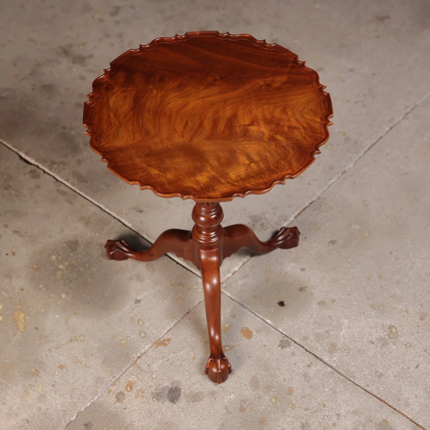 Hand crafted Piecrust table with 24 inch wide highly figured crotch walnut top.