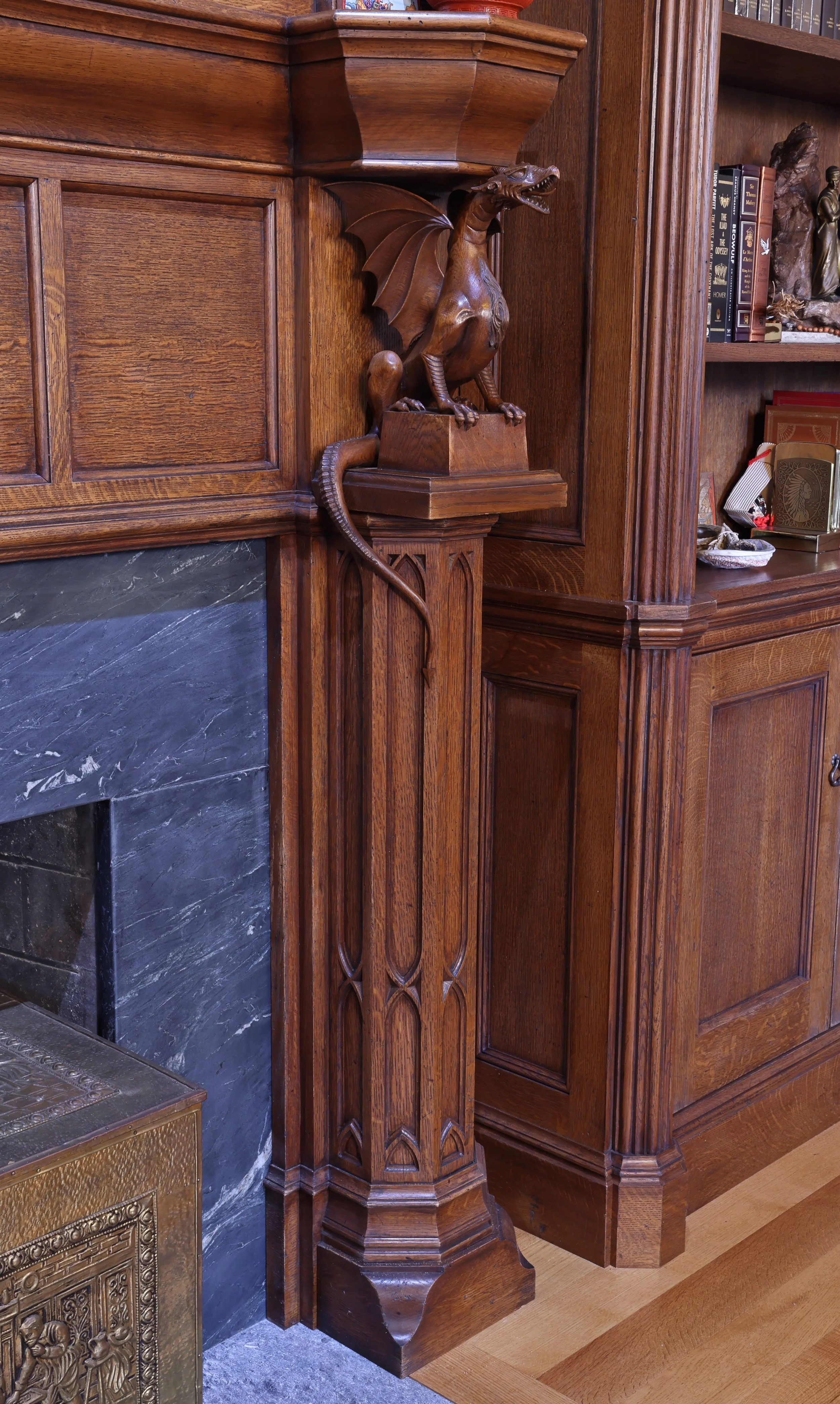 Quarter sawn white oak fireplace mantle, hand carved dragons with an antiqued shellac finish by Benjamin Parry Studios.