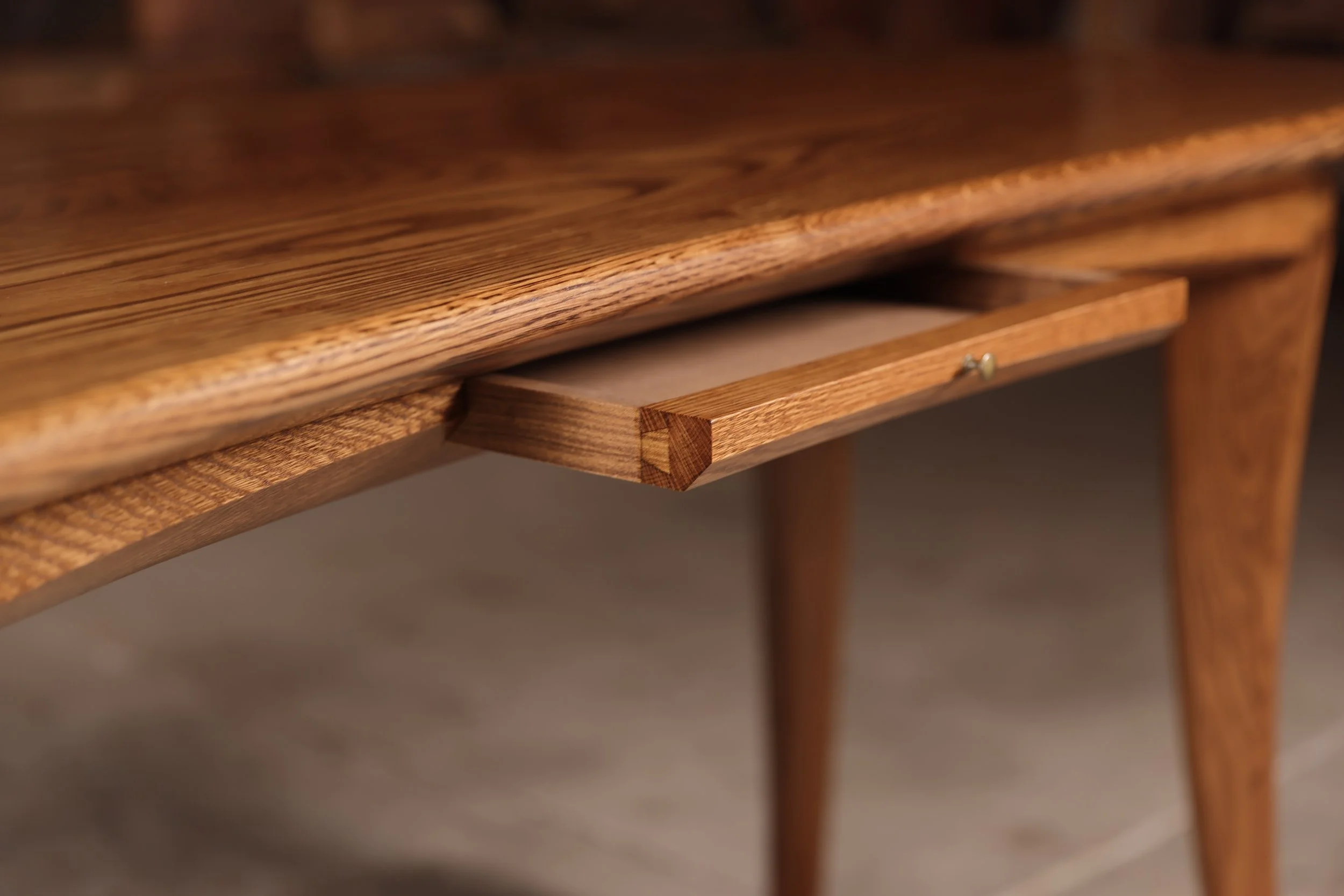 Wharton Esherick style white oak desk, detail of hand cut dovetailed drawer.