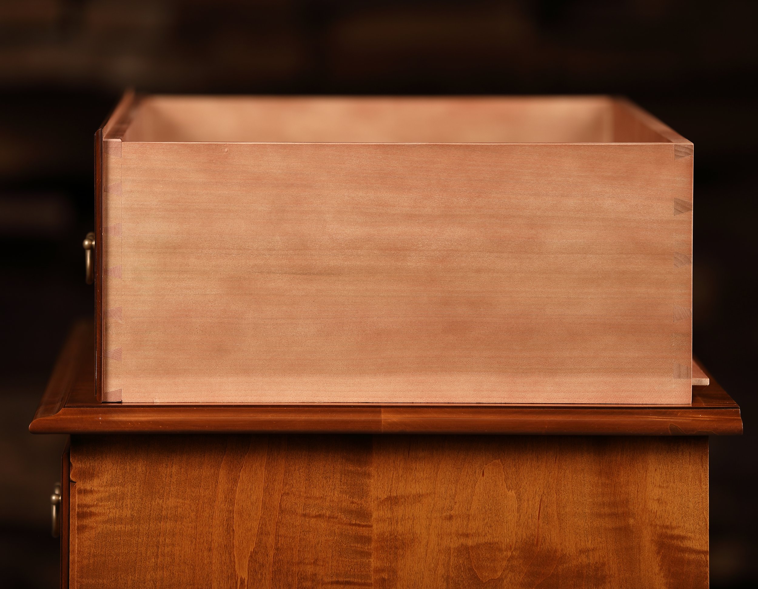 Tiger maple Queen Anne low chest for sale. Hand cut dovetailed drawers.