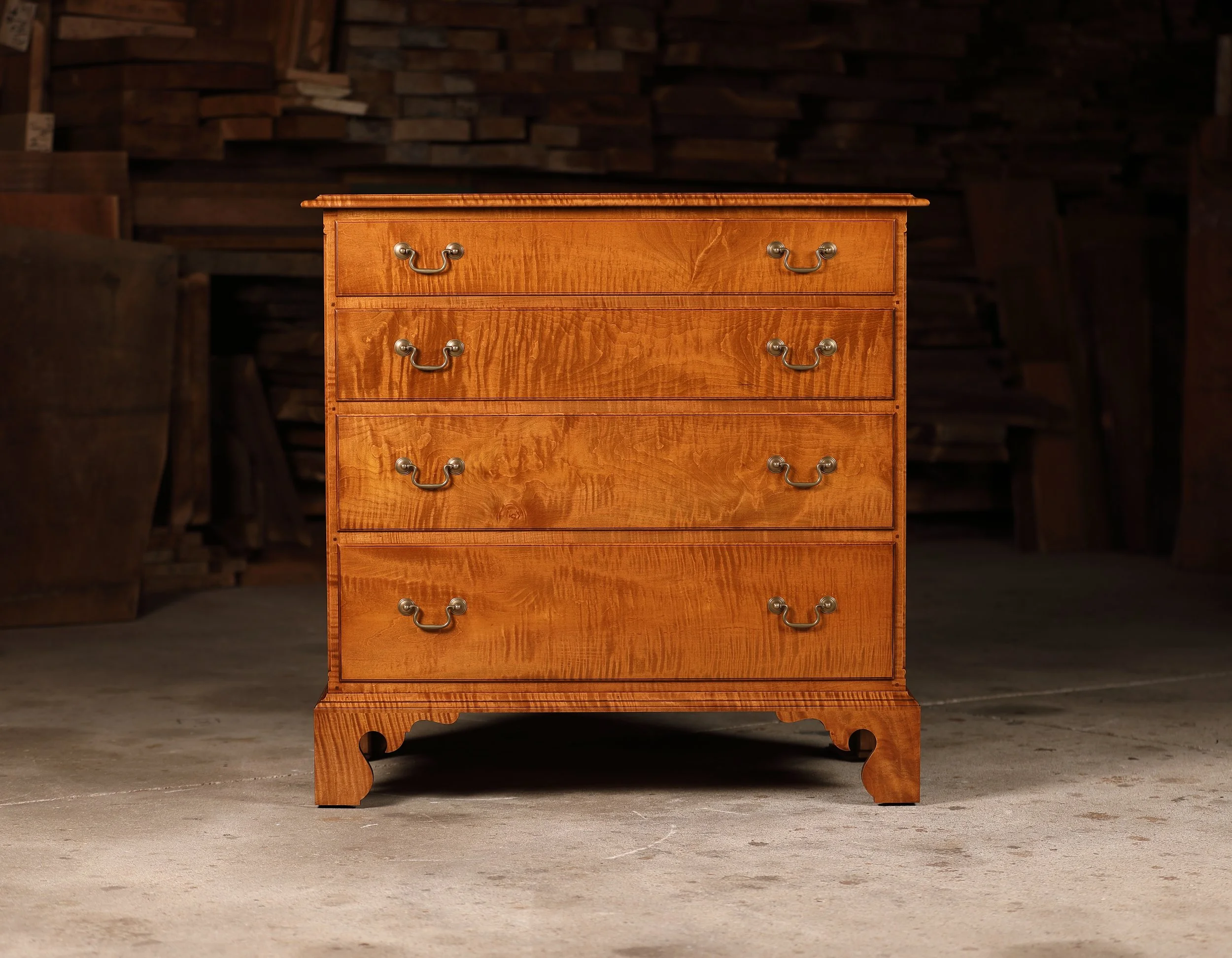 Tiger maple Queen Anne low chest for sale. Front detail.