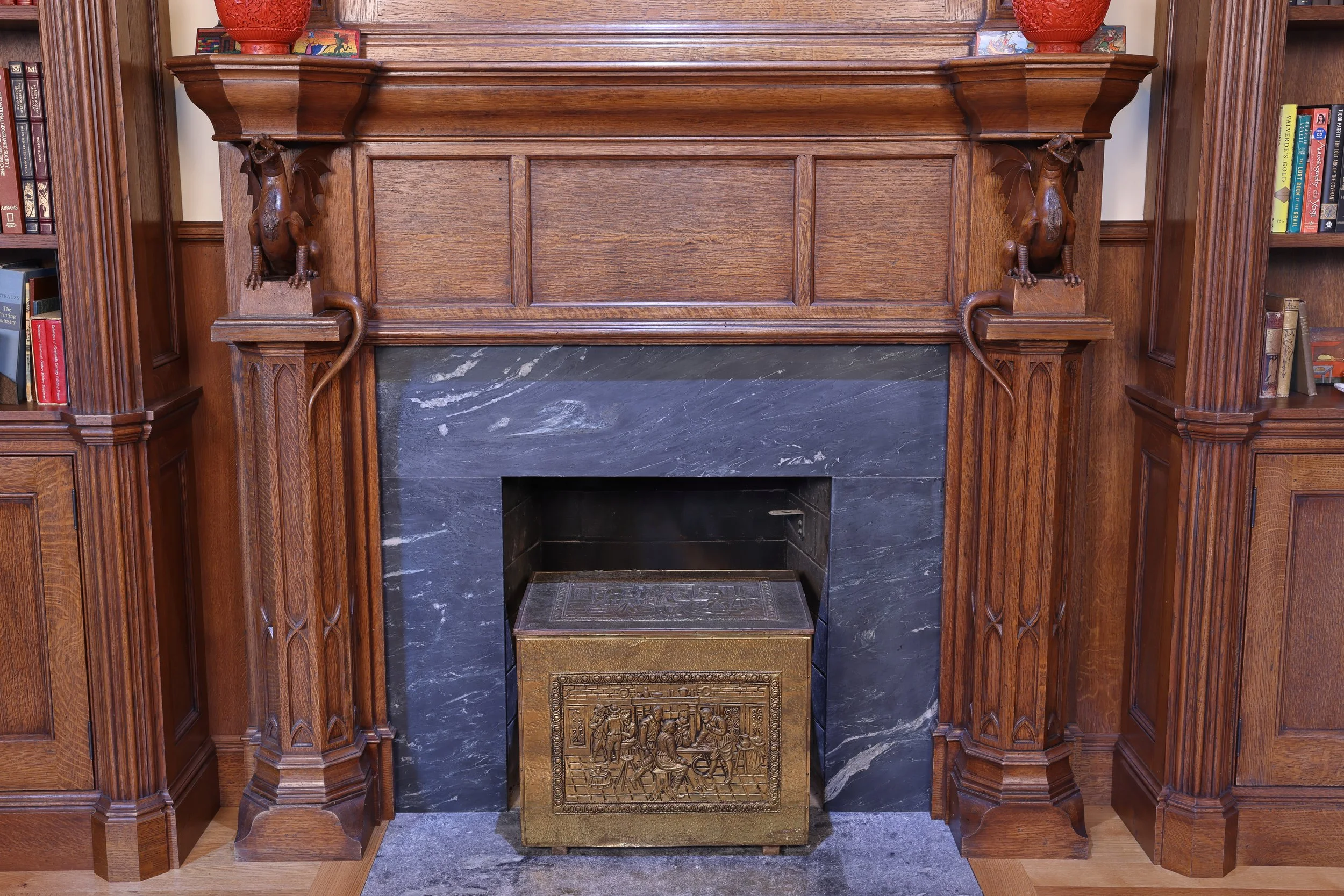Bespoke hand carved Gothic dragons, fireplace mantel architectural millwork, old growth white oak carving.