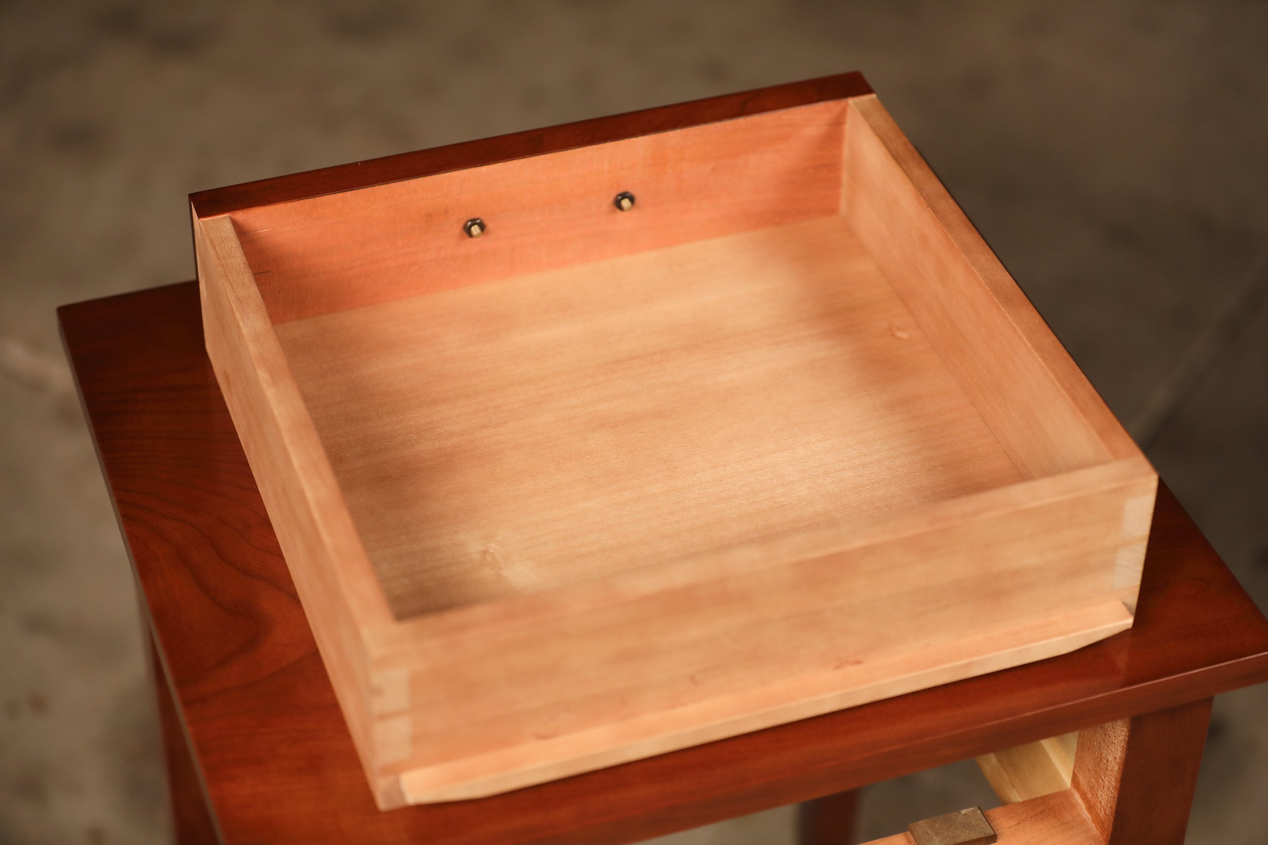 Hand cut dovetail drawer construction.