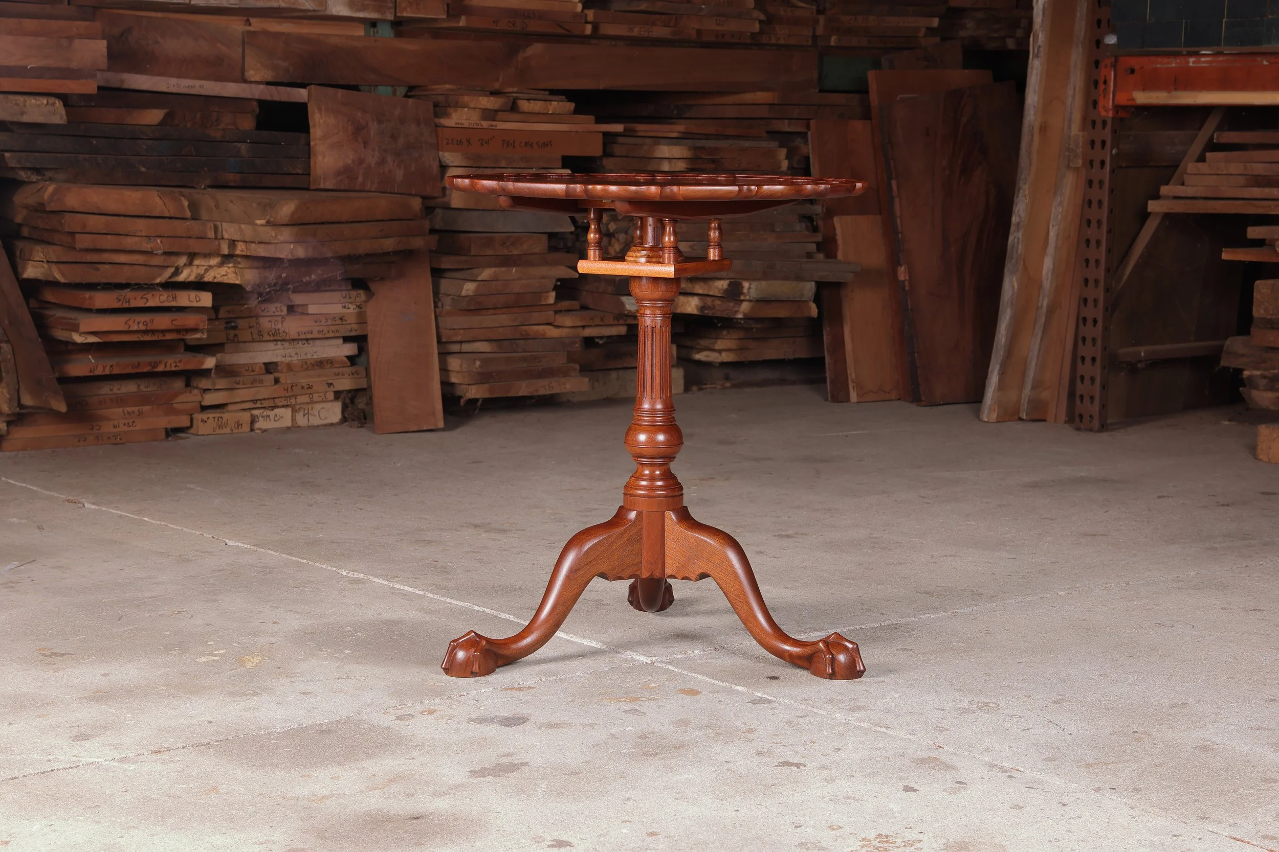 Irion Company walnut piecrust tea table. Side three condition photo.