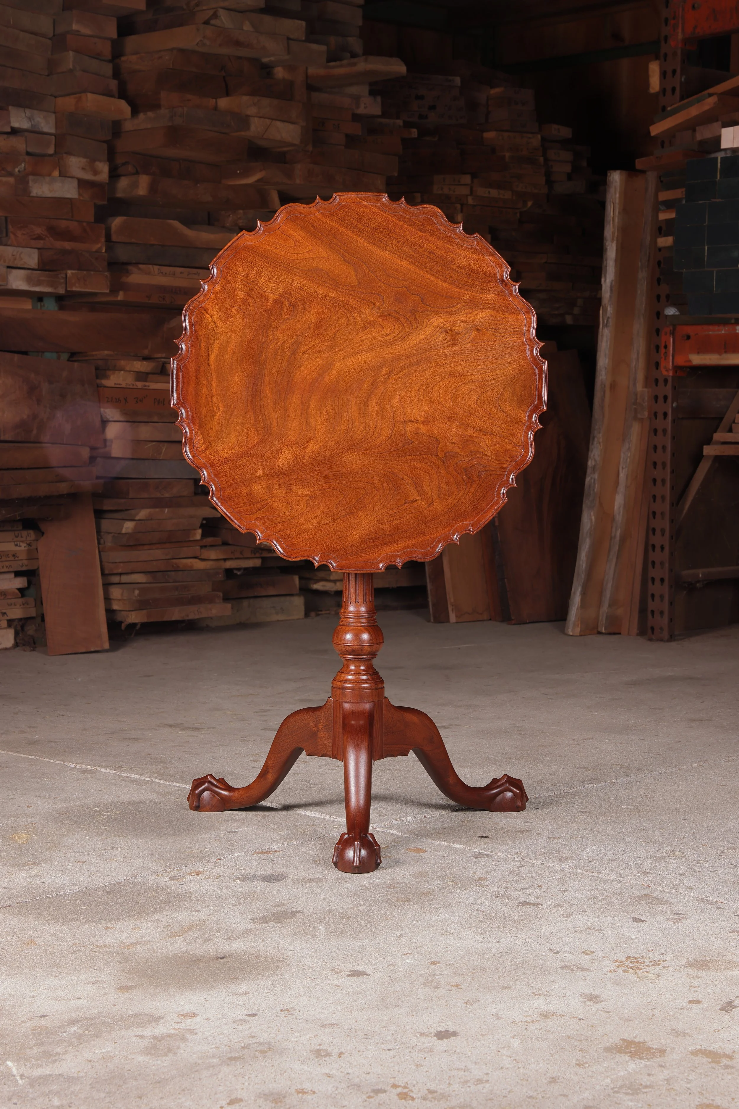 Handmade Philadelphia Piecrust Table shown with top tilted.